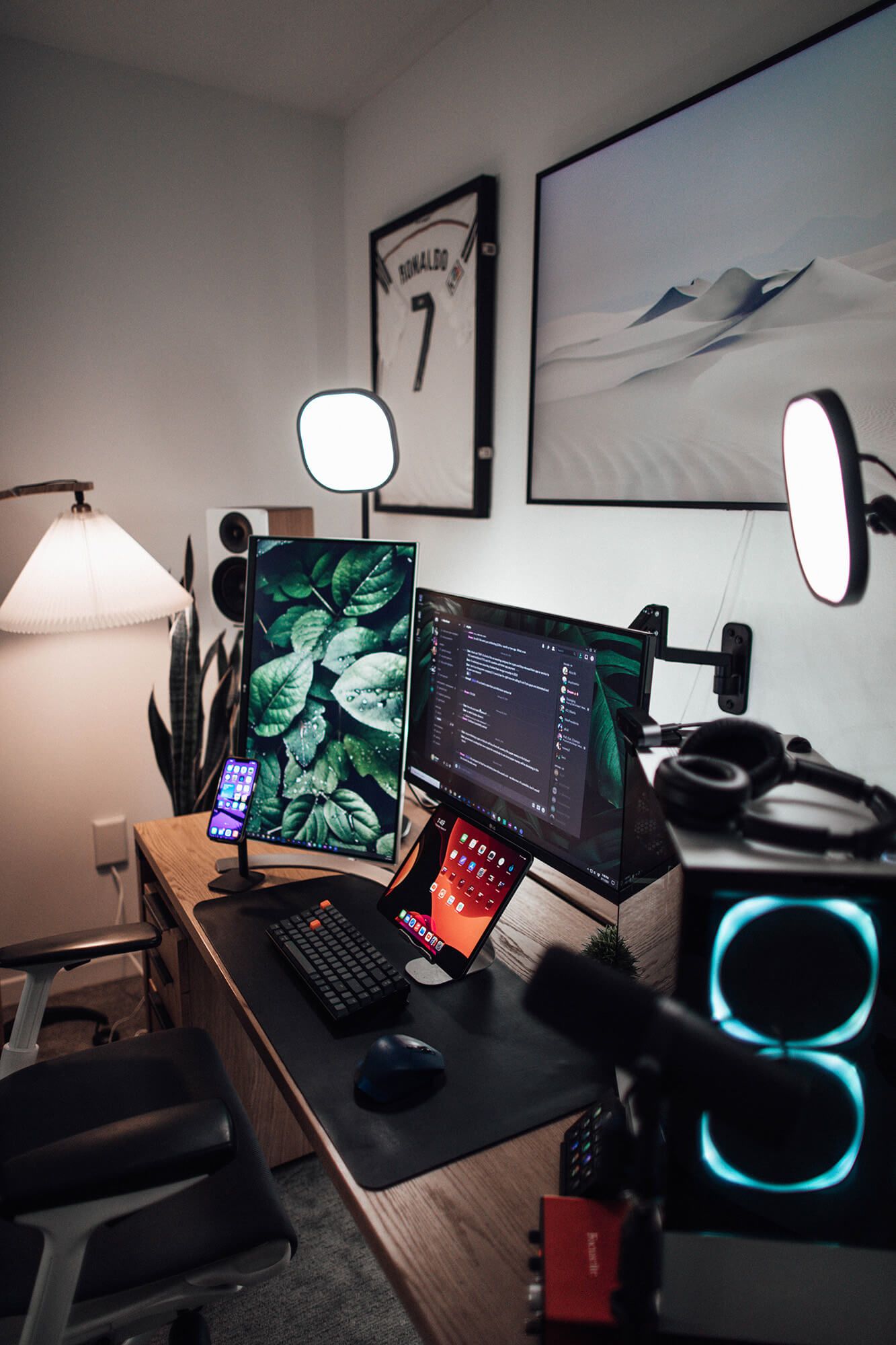 Bedroom setup with a signed Ronaldo's jersey on the wall