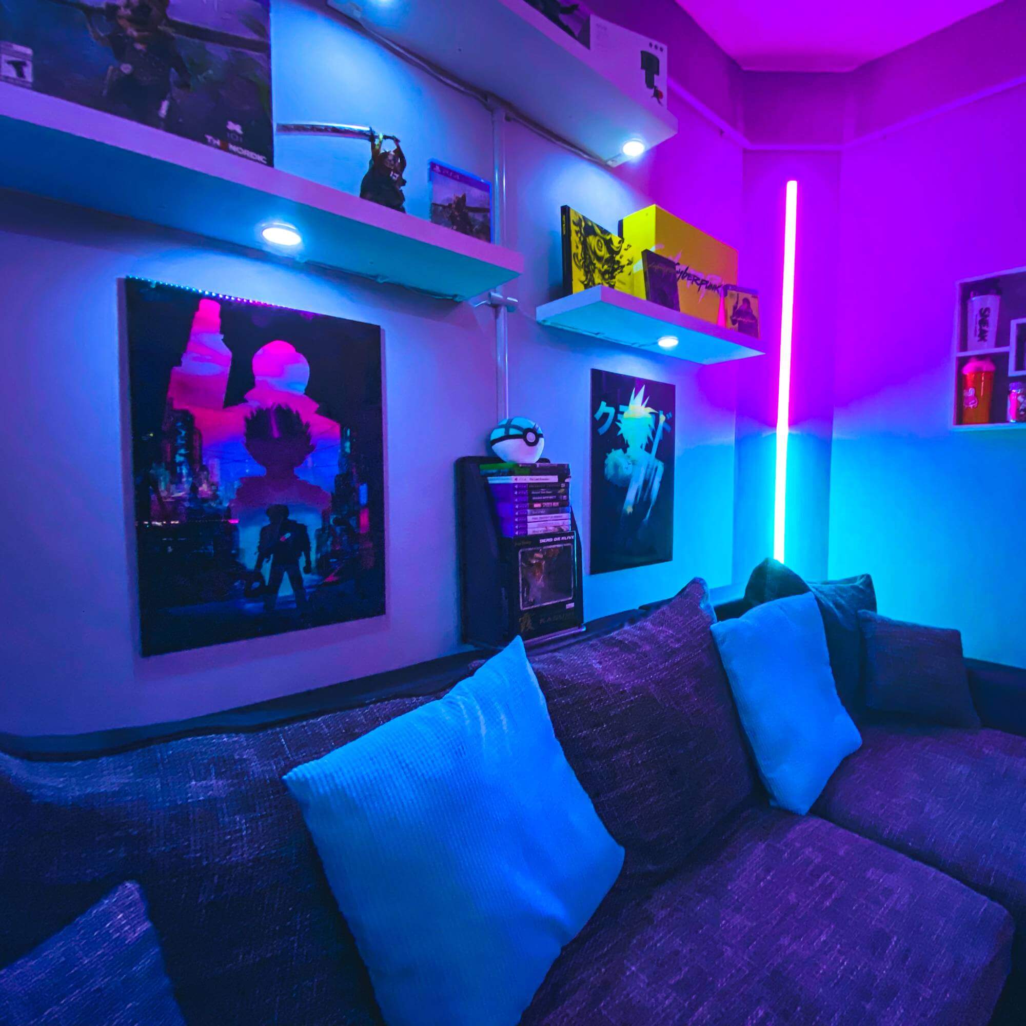 Cosy space with sofa, wall lighting and spotlights