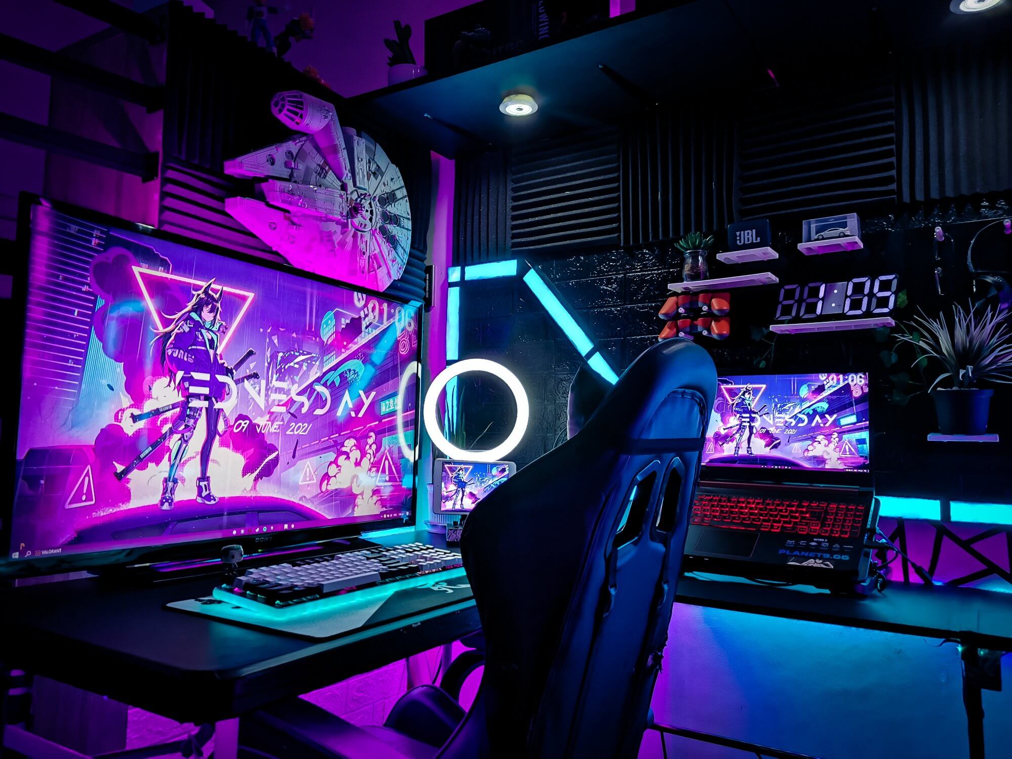 An RGB battlestation with custom-made neon light bars