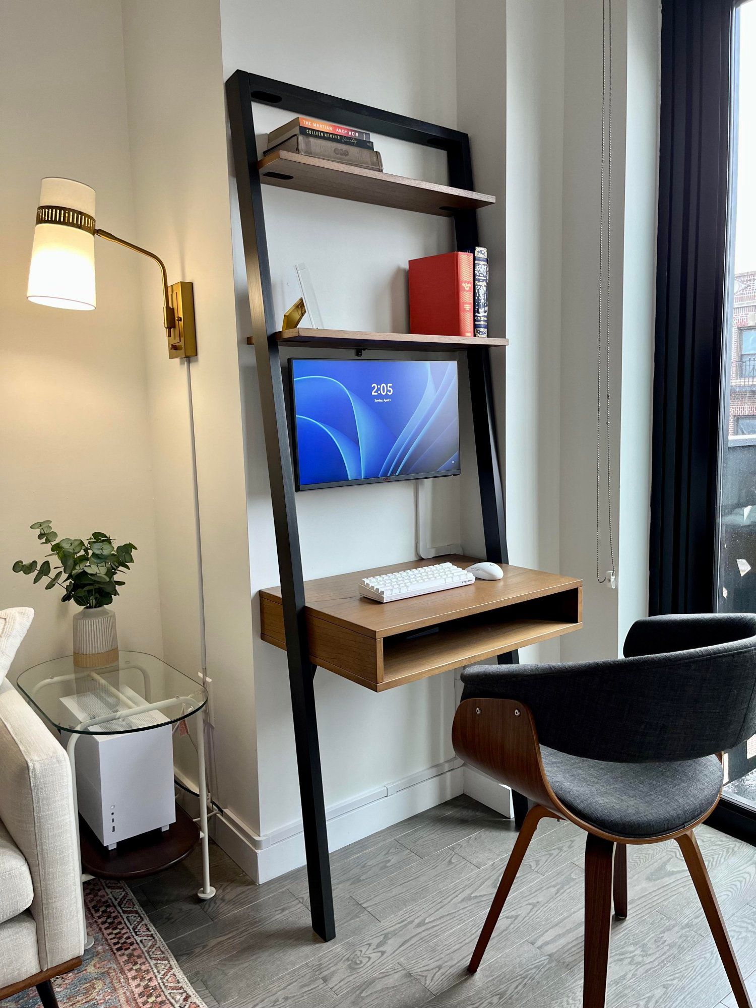A stylish tiny home office with a multifuctional desk