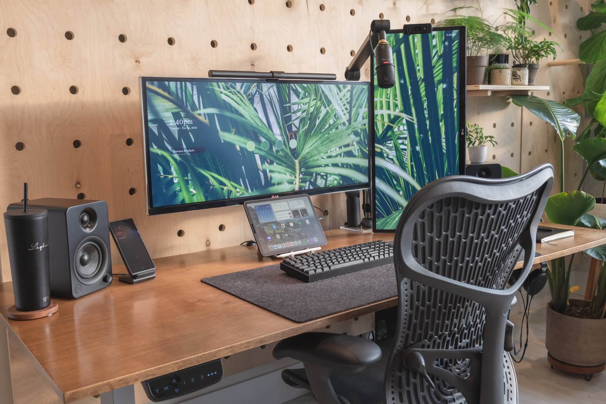 Nicholas’ botanical workspace with a pegboard wall in Kelowna, Canada