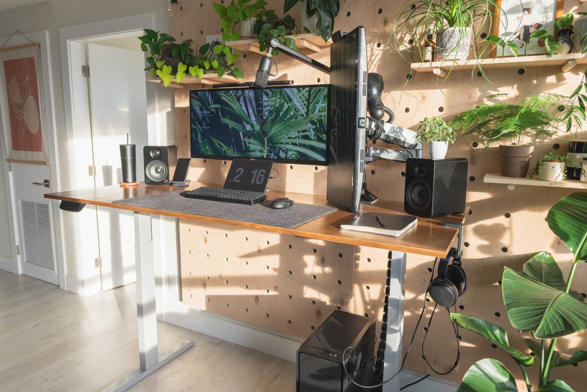 The green workspace featuring a giant pegboard