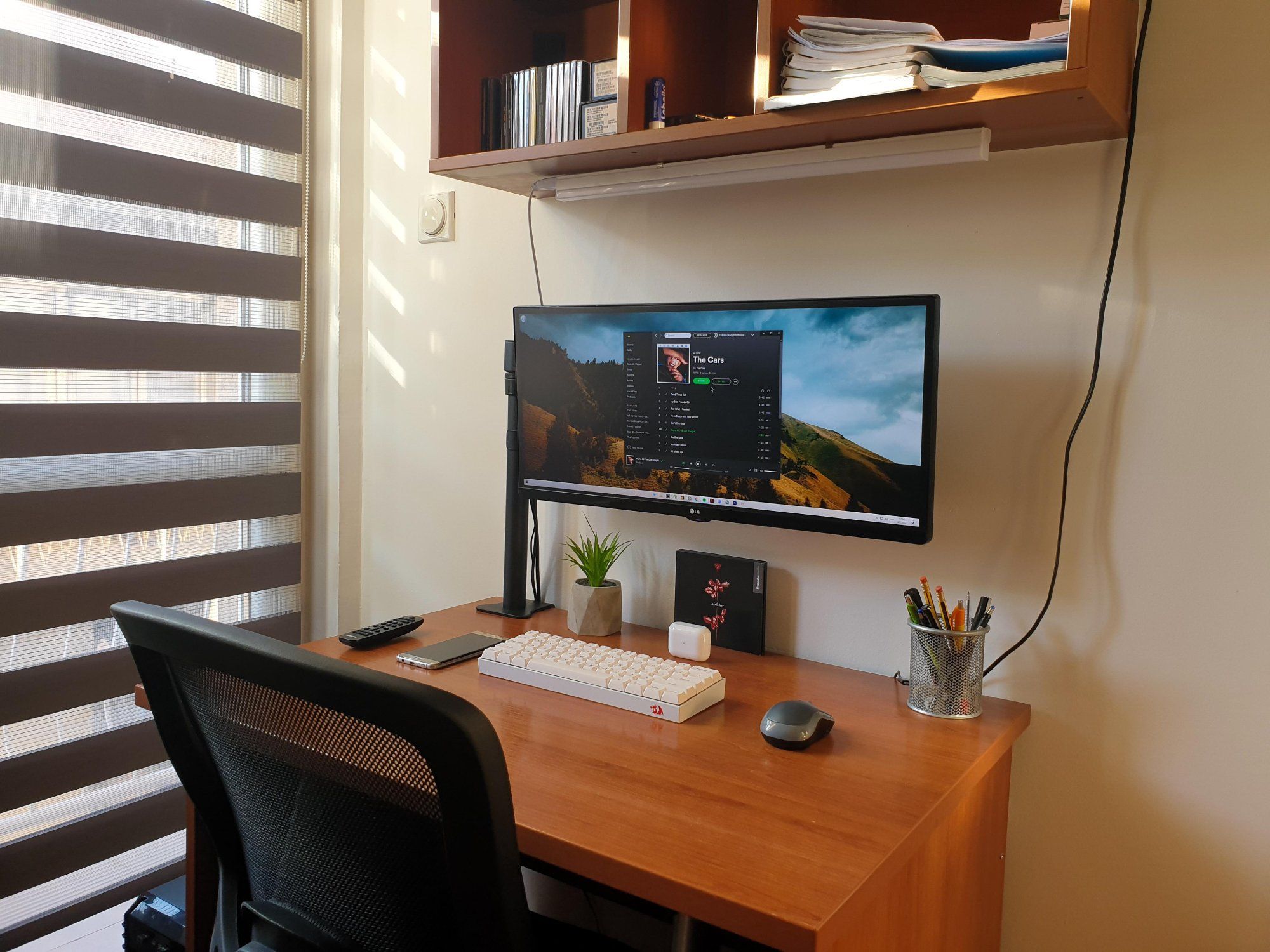 Small space desk setup with wireless peripherals