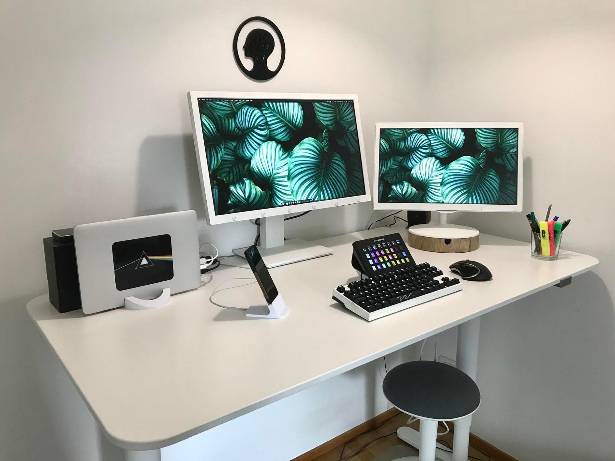 An IKEA BEKANT standing desk in a dual monitor desk setup