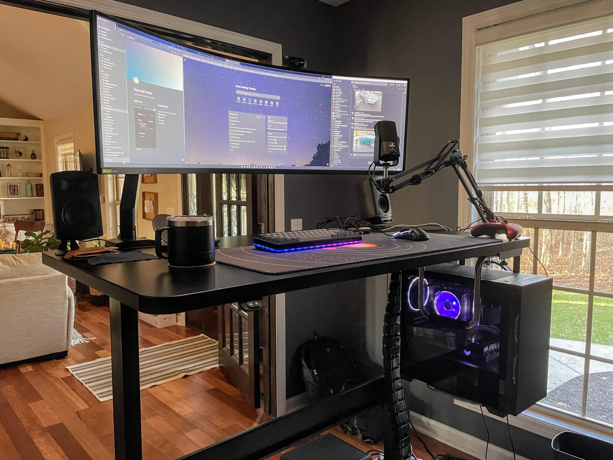 A home office with a VertDesk v3 sit-stand desk