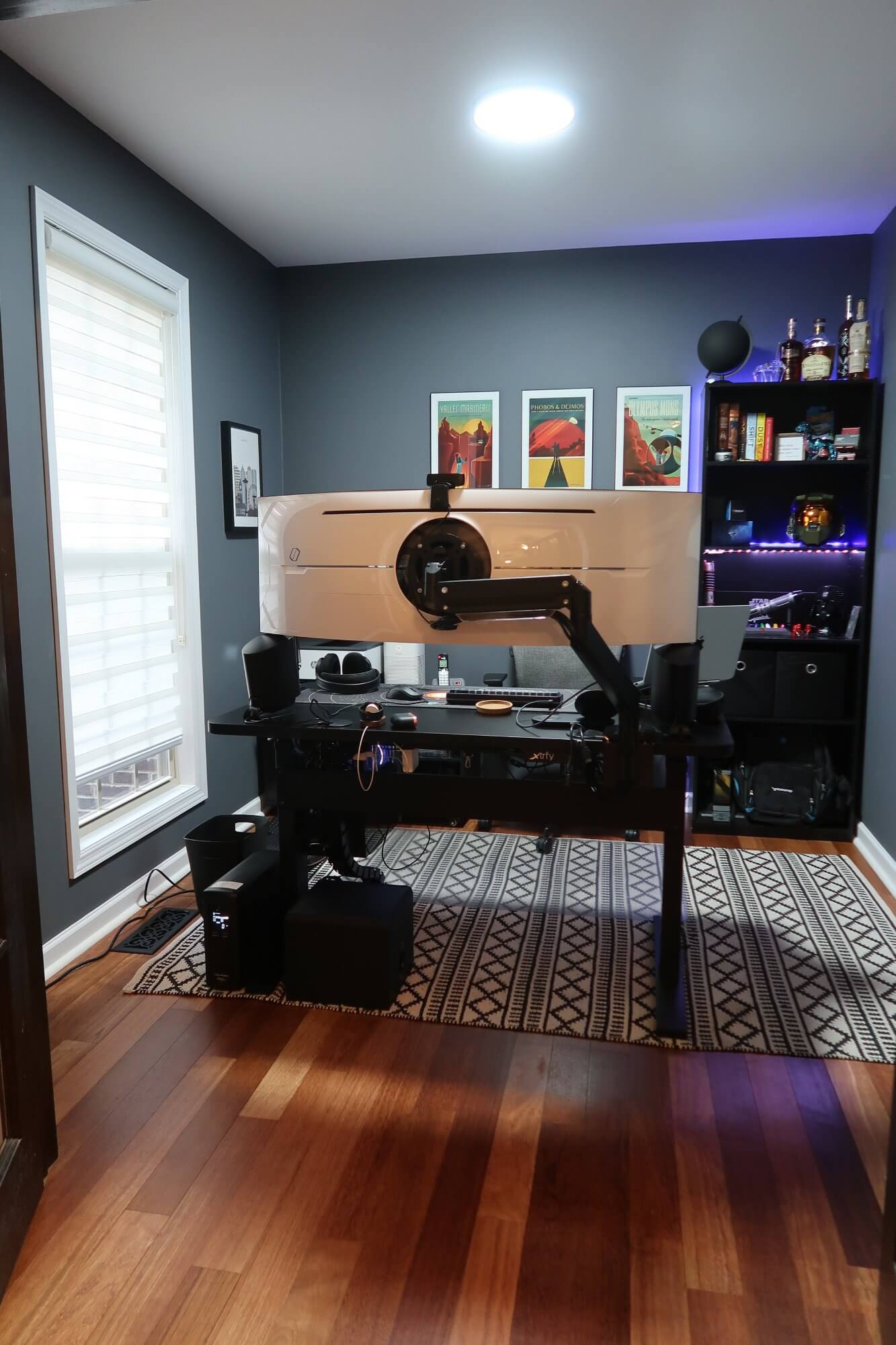 A home office with a VertDesk v3 sit-stand desk