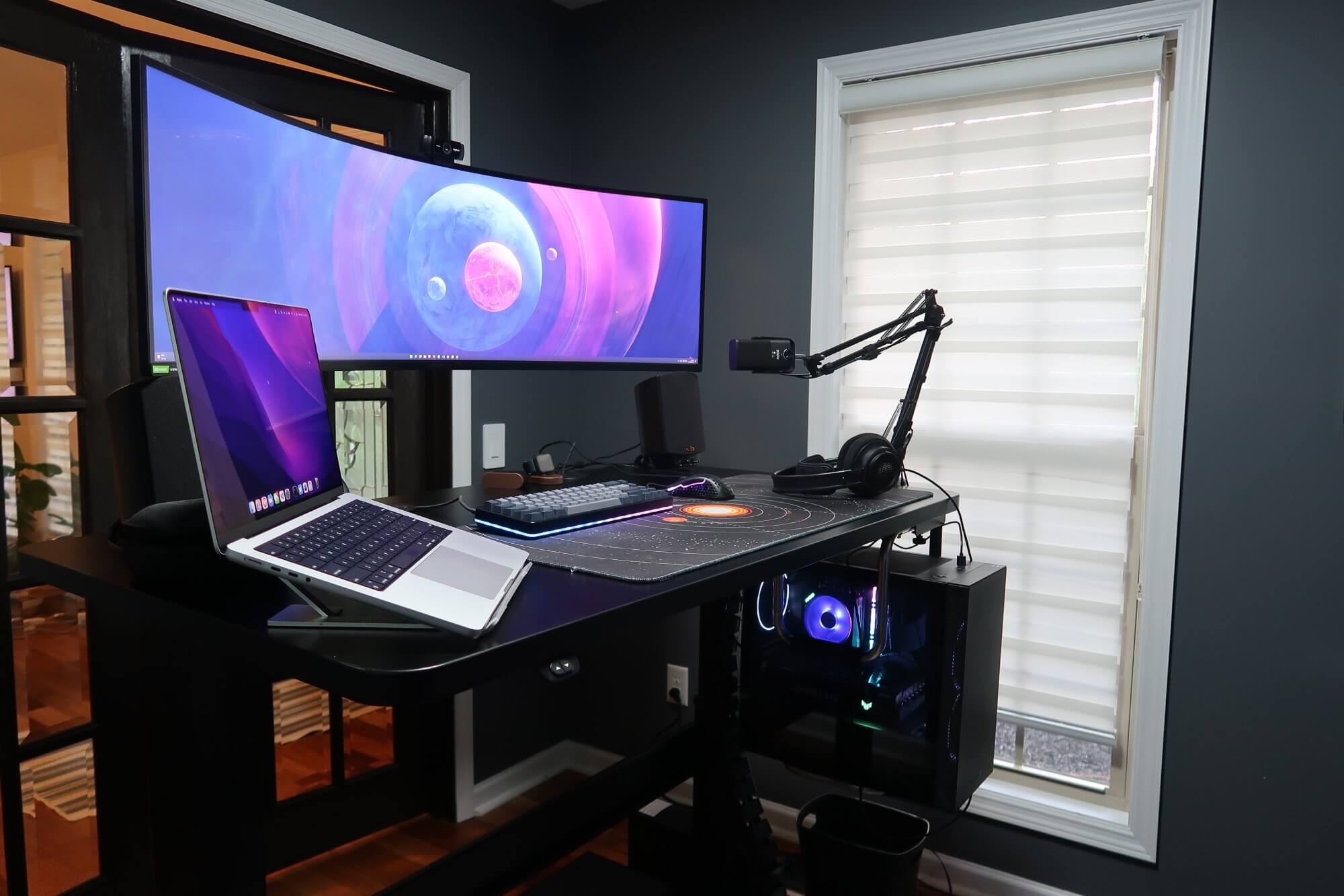 A home office with a VertDesk v3 sit-stand desk