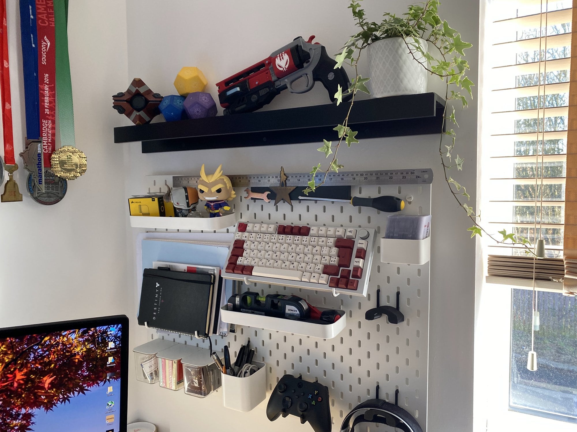 A white SKÅDIS pegboard from IKEA