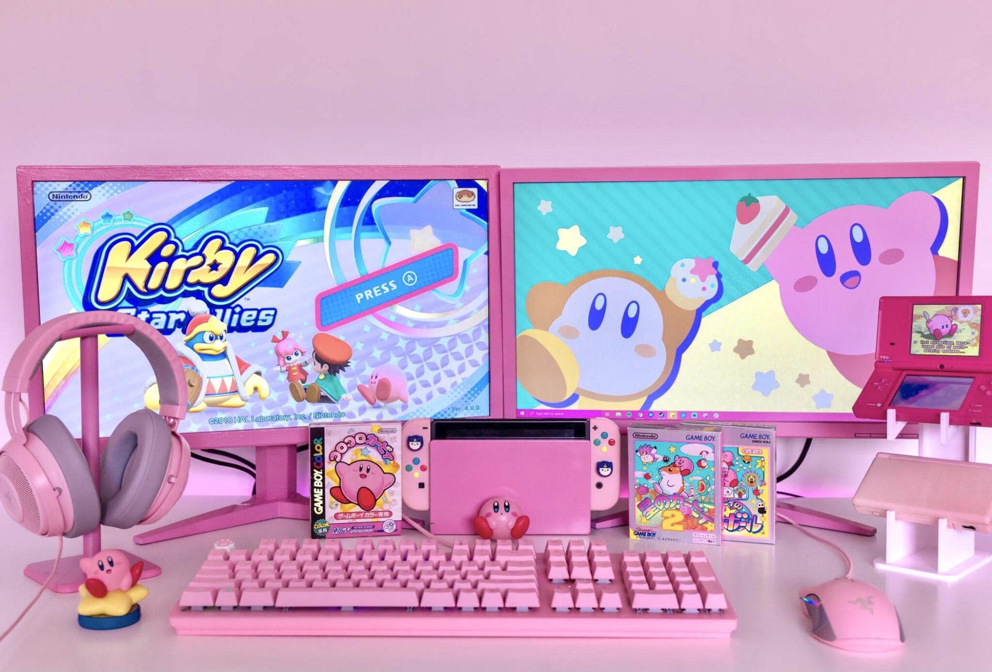 A pink gaming desk setup