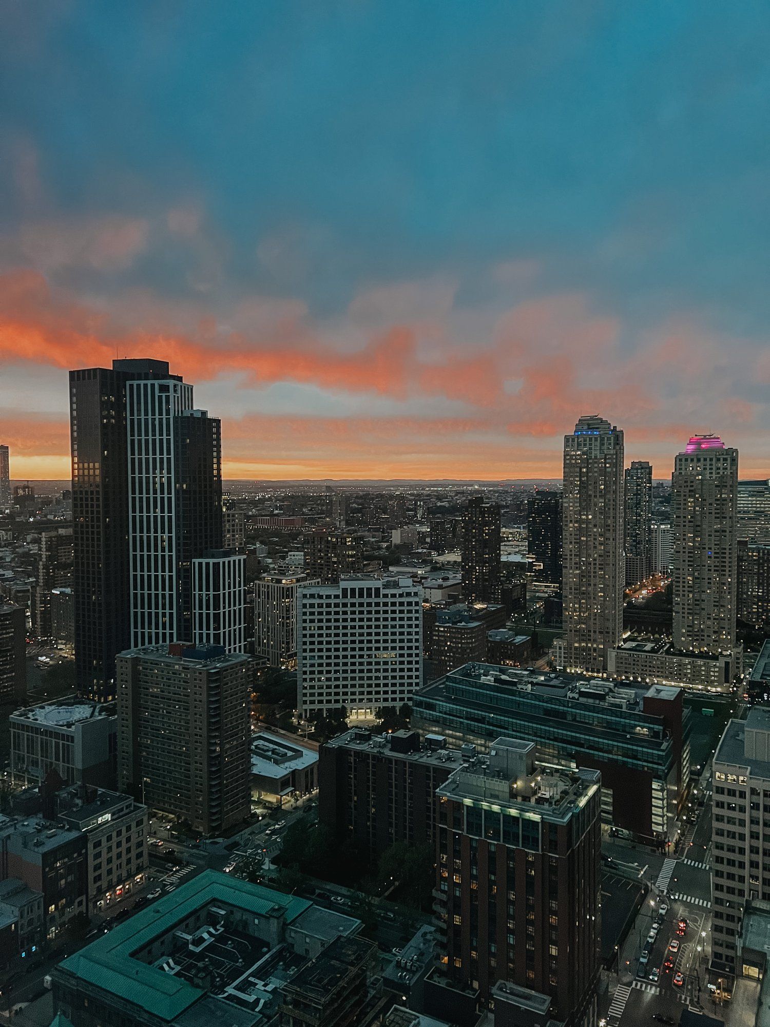 Every night, Katie can enjoy the view of the sunset over the city right from her desk