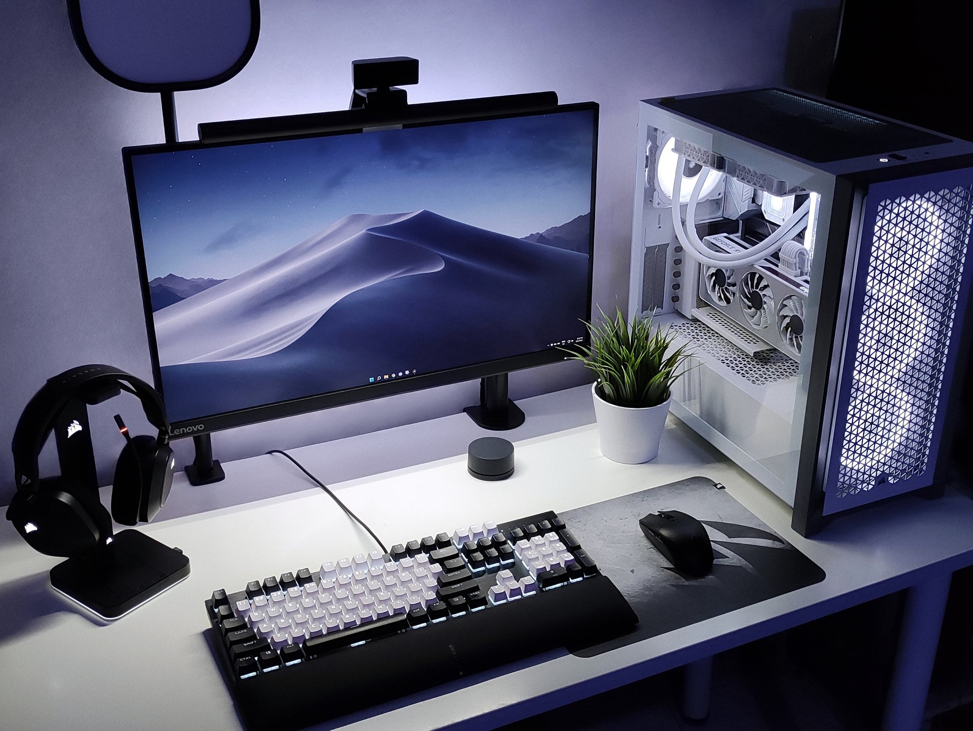 A home workspace in dark and deep blue tones