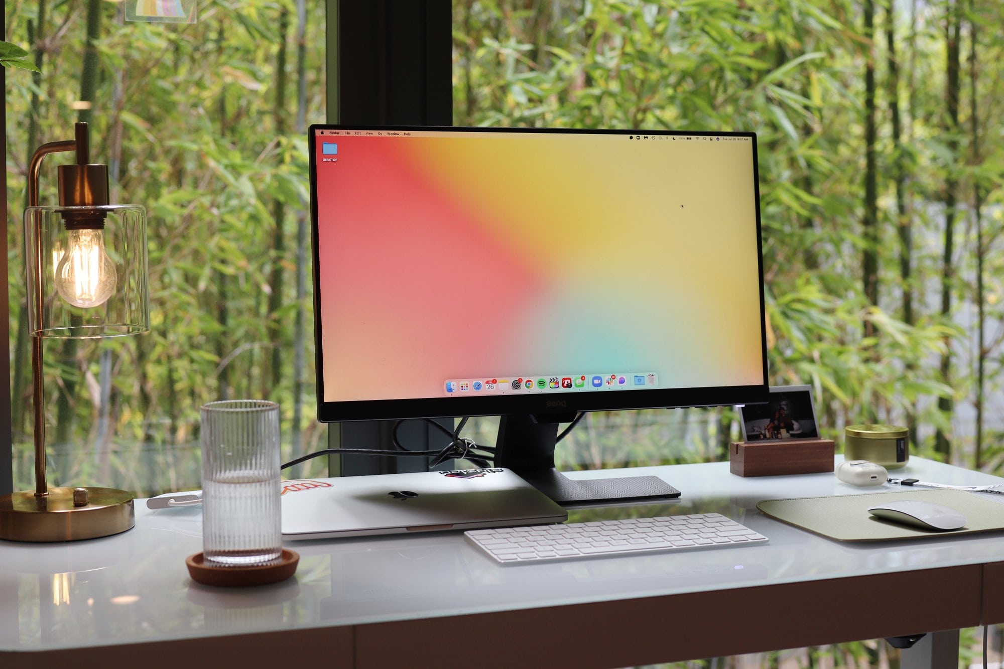 A standing desk with tempered glass
