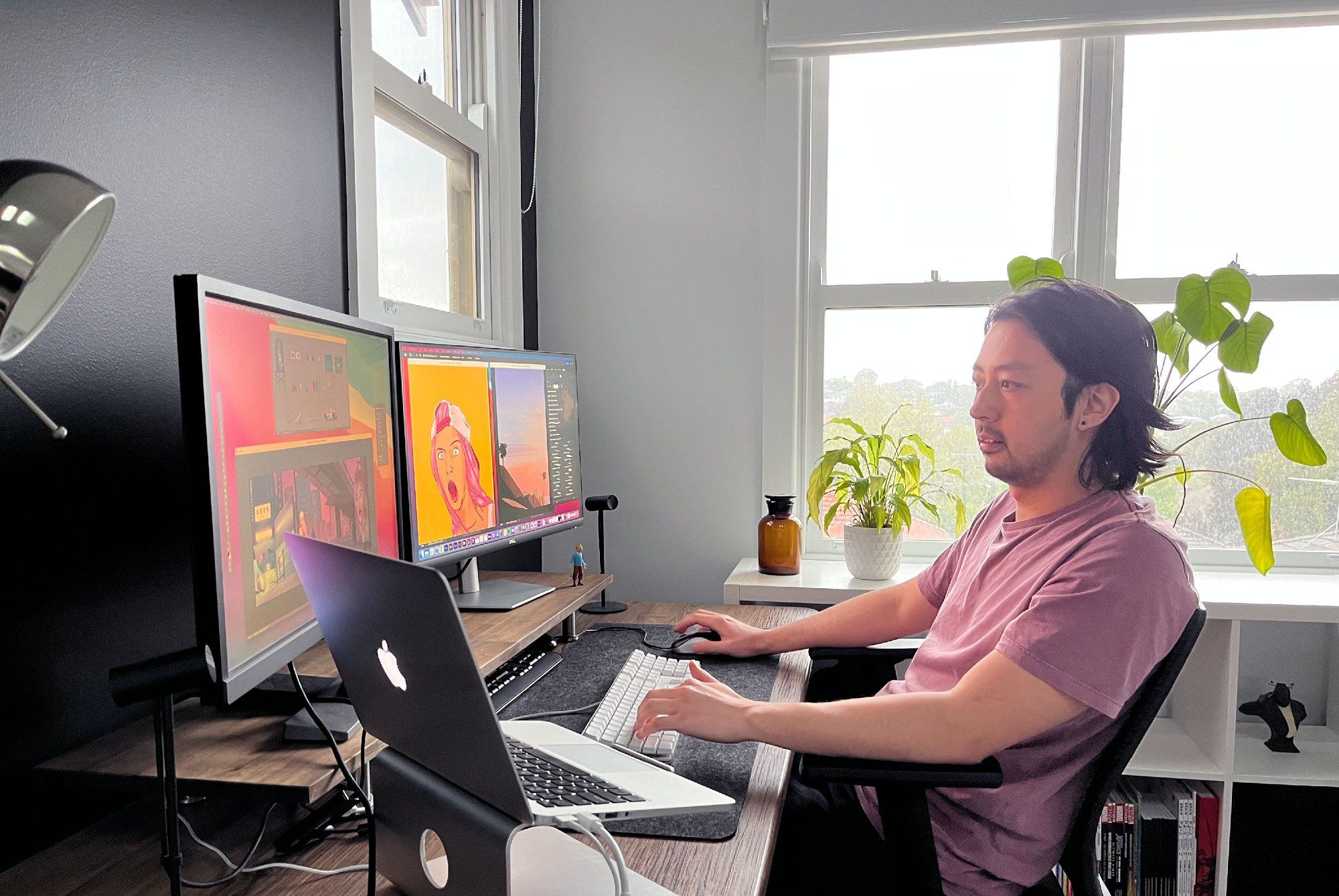 Creative director Jono Yuen at his desk