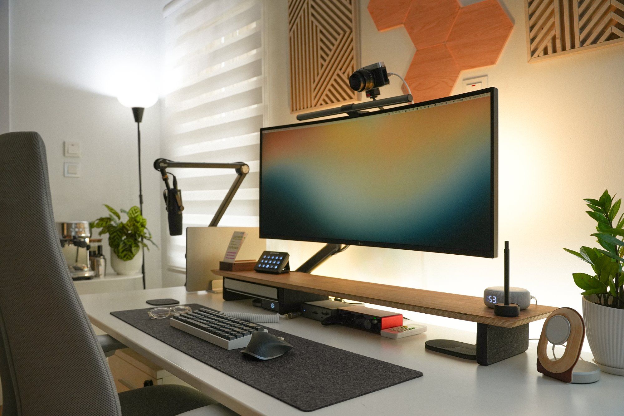 A well-organised home office in Nigeria, complete with an Autonomous standing desk, an ergonomic chair, a custom mechanical keyboard, an LG monitor and other equipment