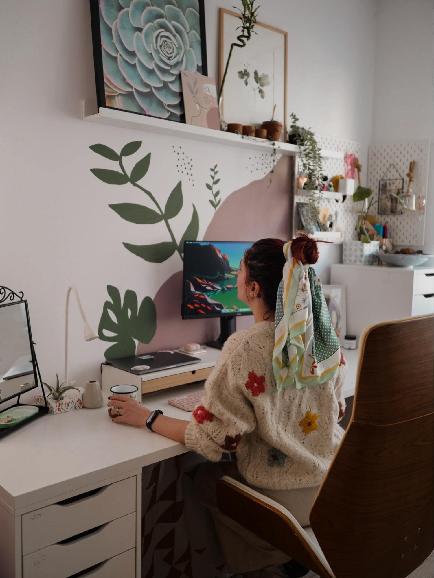 Stefana Teodoroiu, a content creator from Bucharest, Romania, at her DIY home office