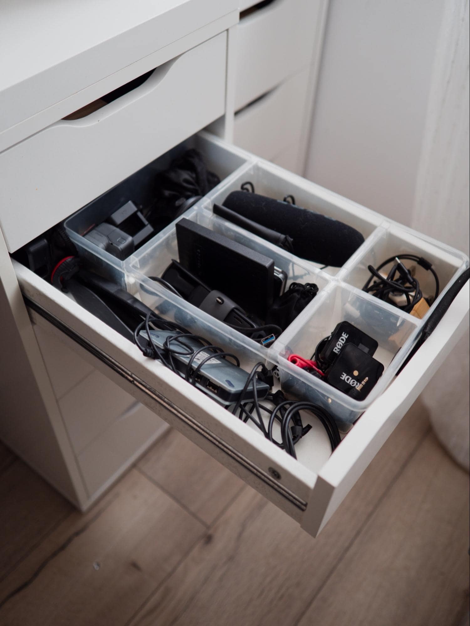 A storage system for photo and video accessories inside the IKEA ALEX drawers