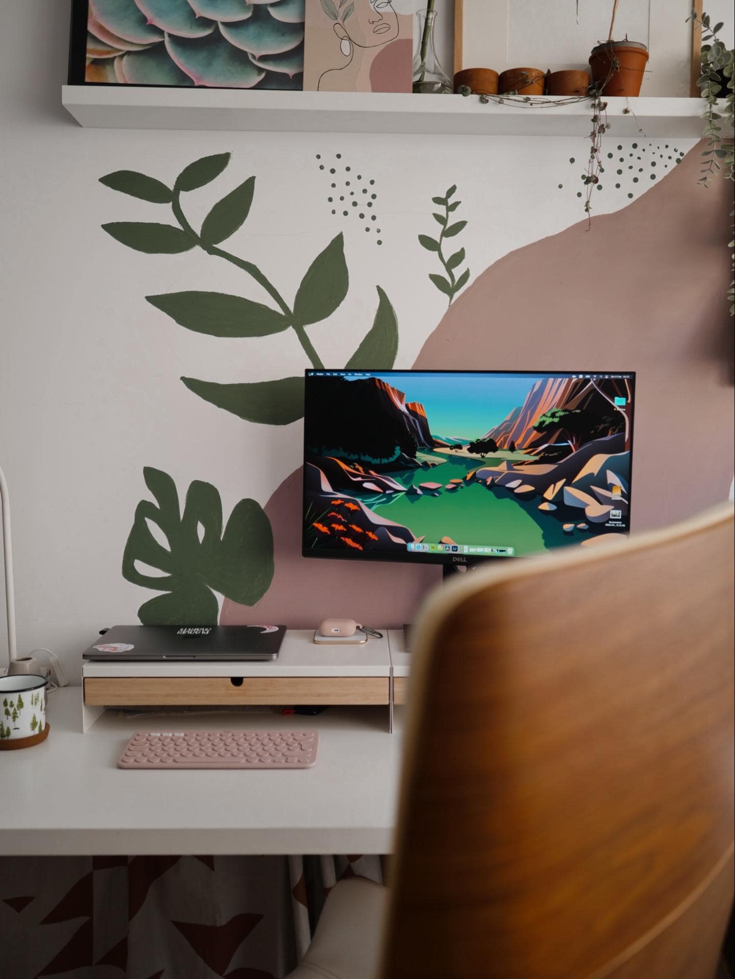 A DIY home office setup with a wireless Logitech K380 keyboard and a DELL monitor