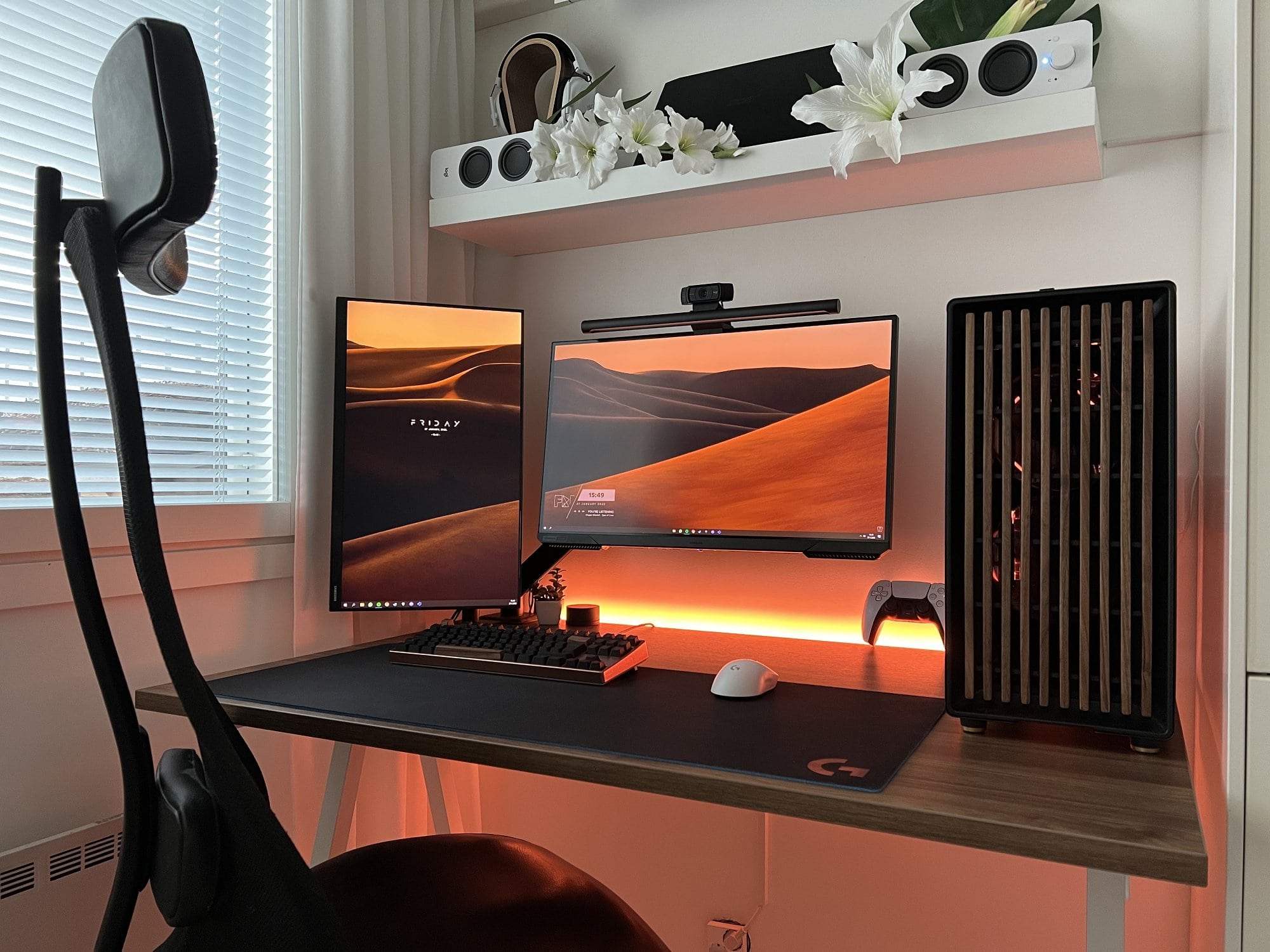 A multi-screen home workstation with an ergonomic chair