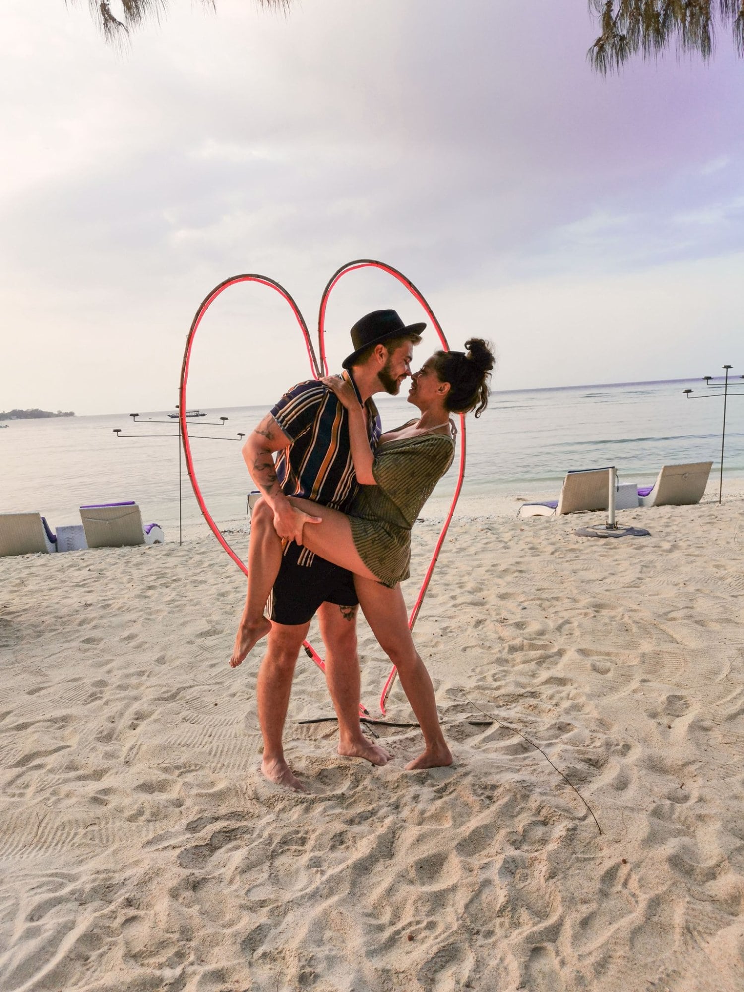 Joel Honkanen and his girlfriend on the beach