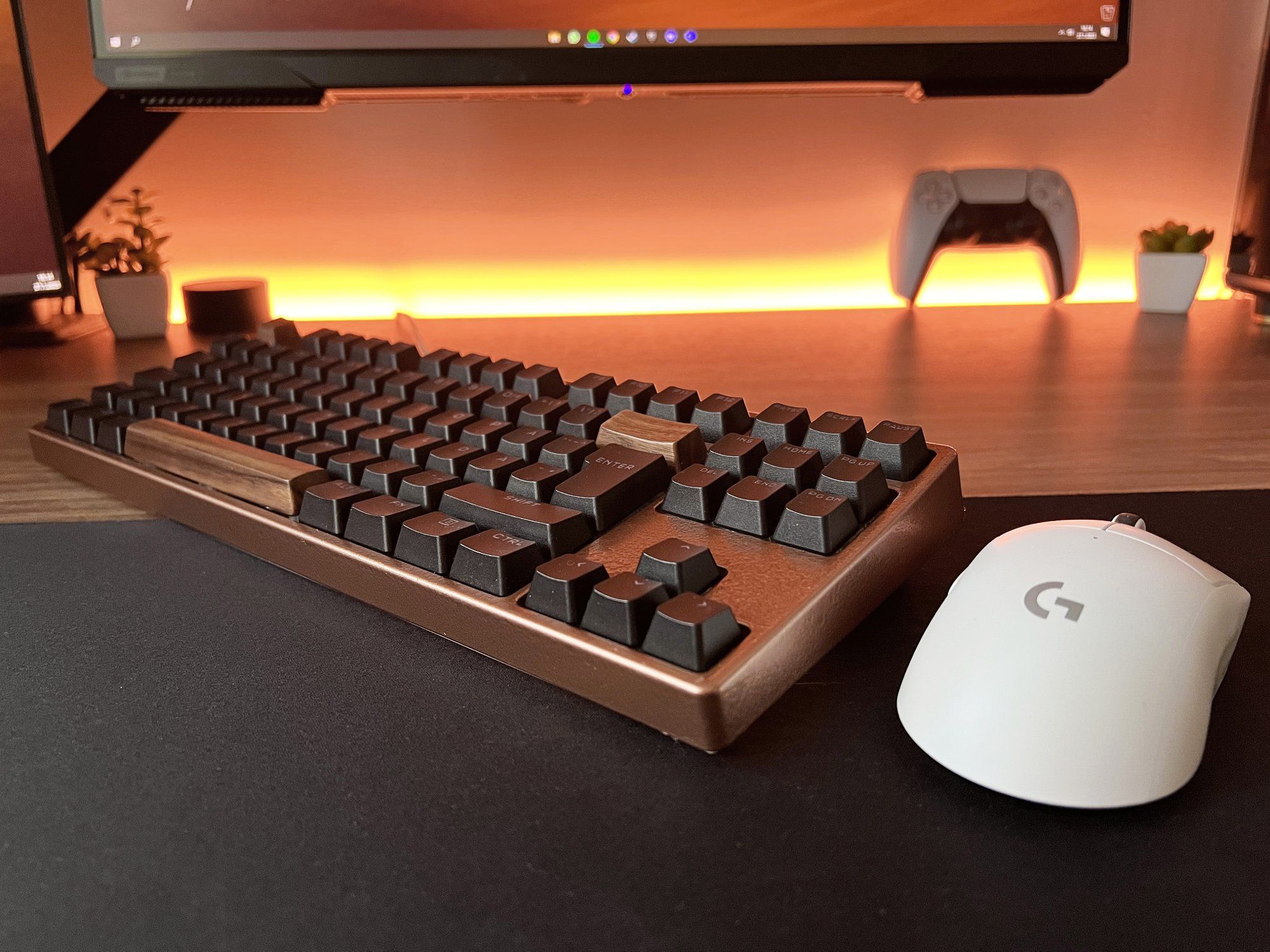 A Xtrfy K4 Tenkeyless with painted frame, custom keycaps and sound mods, and a Logitech G PRO X Superlight mouse