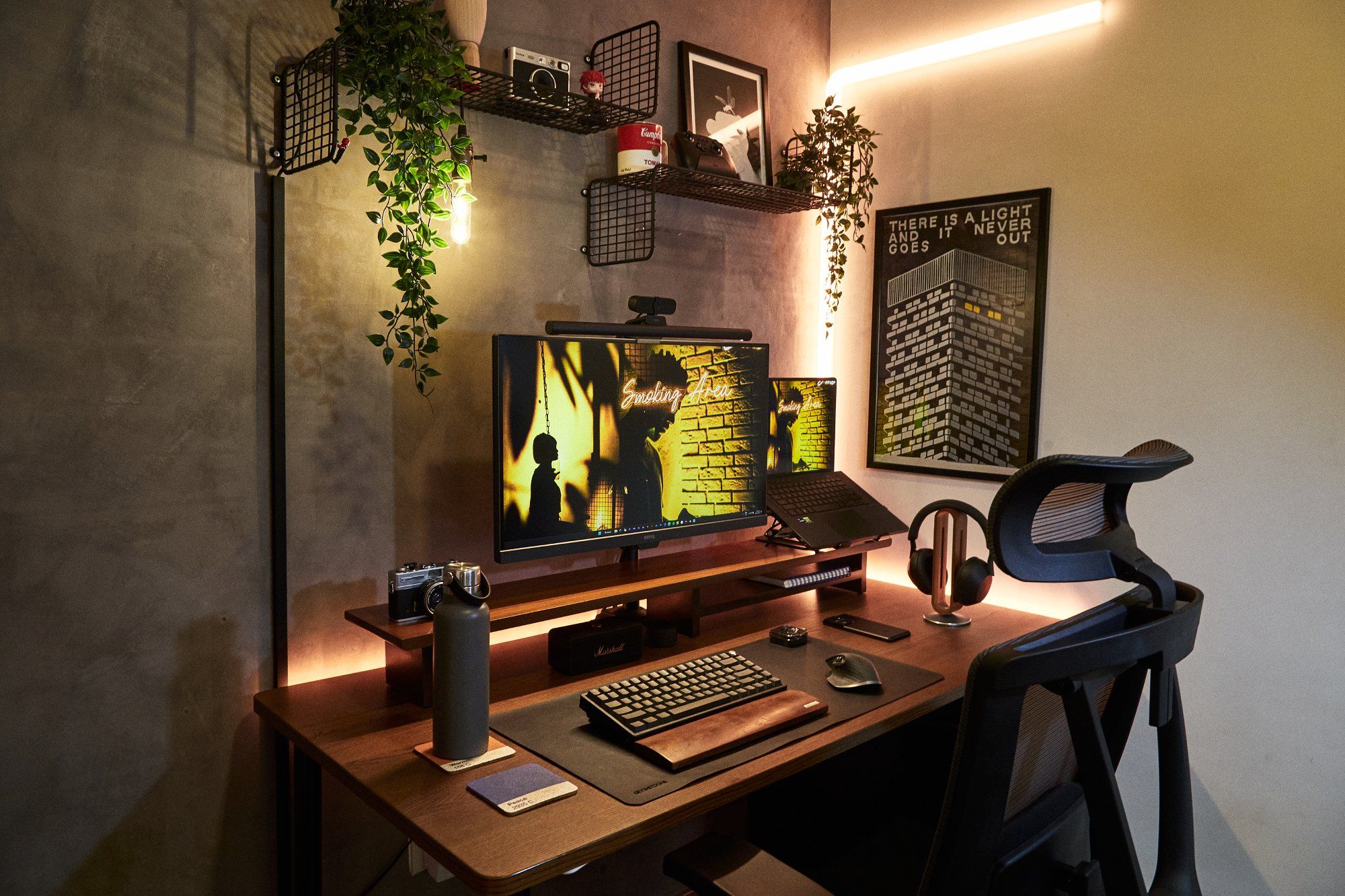 A clean, decluttered home office with a BenQ monitor, an ergonomic chair, and an IKEA IDÅSEN desk