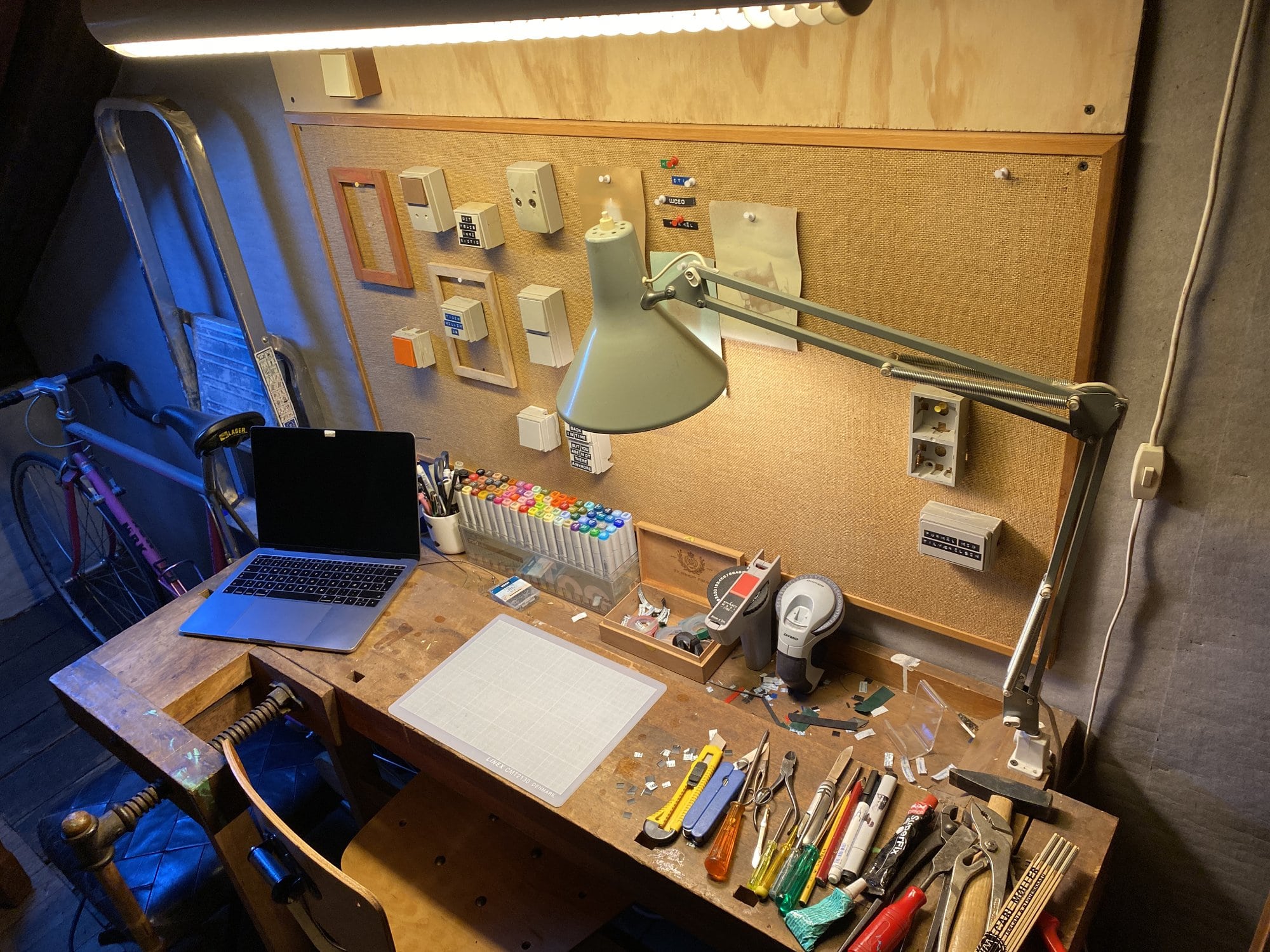 A cosy workspace in the attic with lots of art supplies