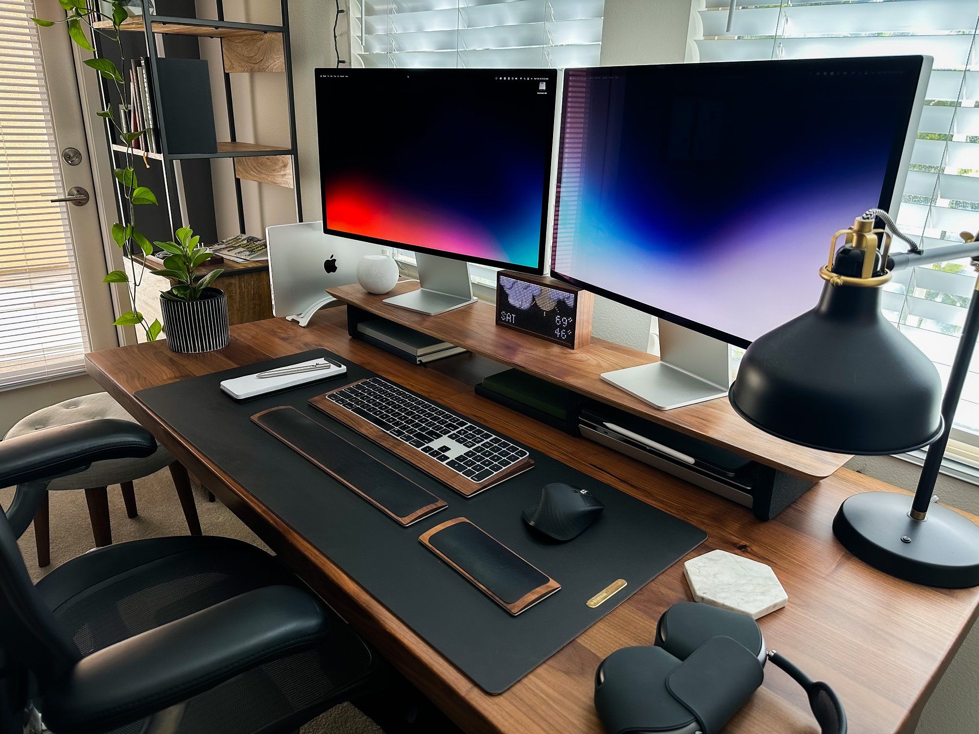 The neatly organised dual-screen standing desk setup