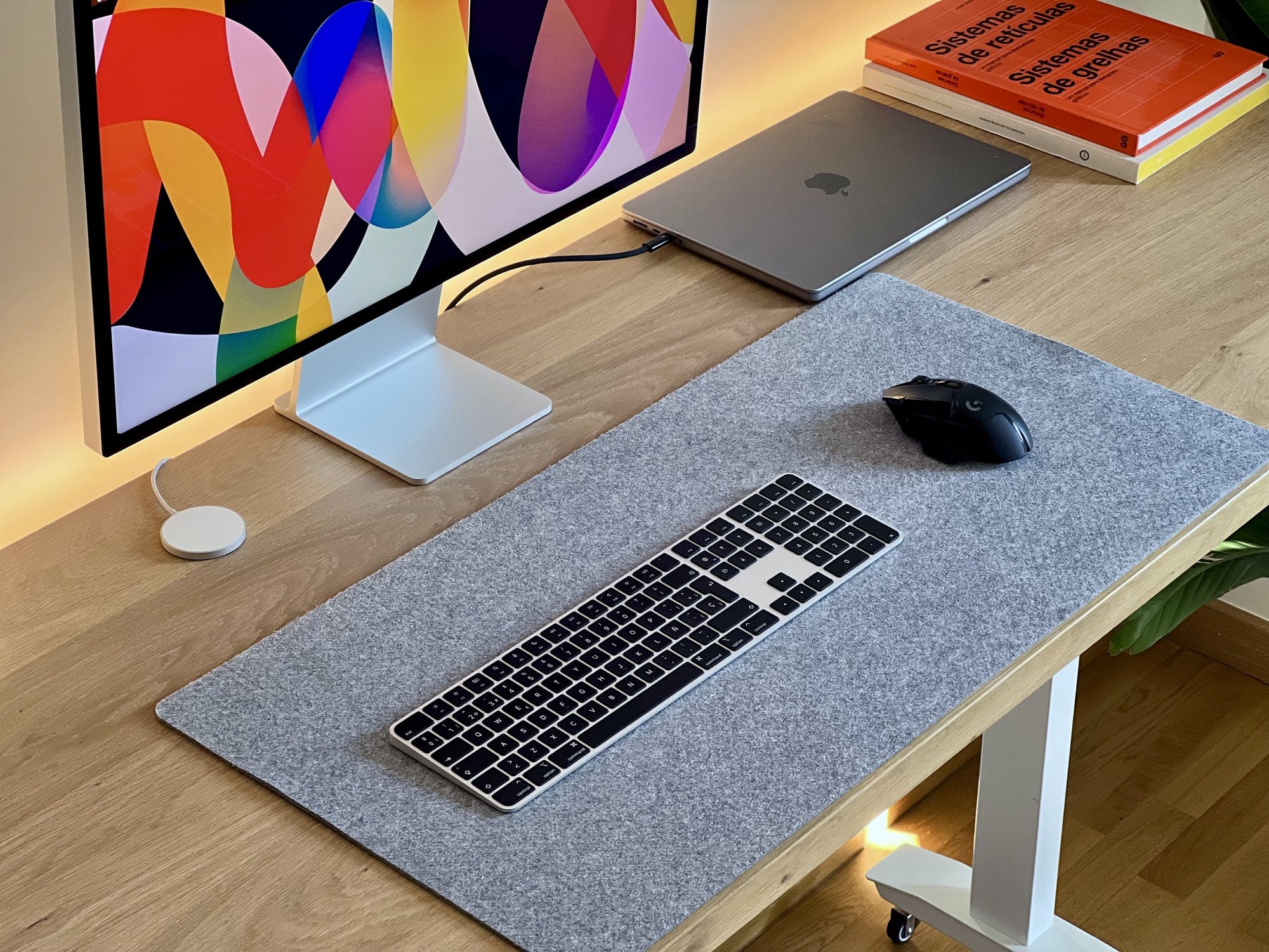 A minimal and clean designer’s home office with a standing desk in Spain