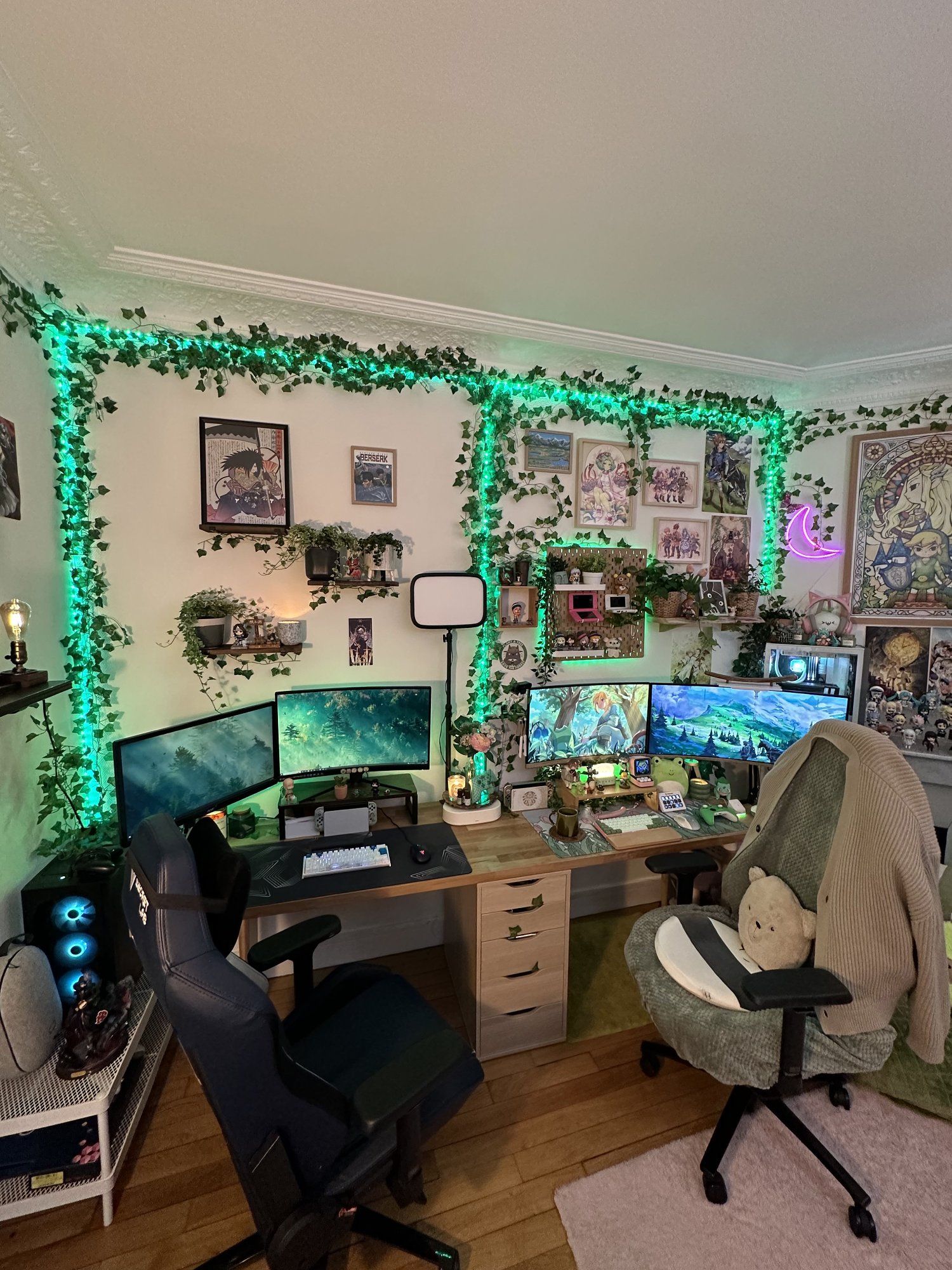 A cute and cheerful Japanese-inspired dual desk setup with artificial ivy on the walls