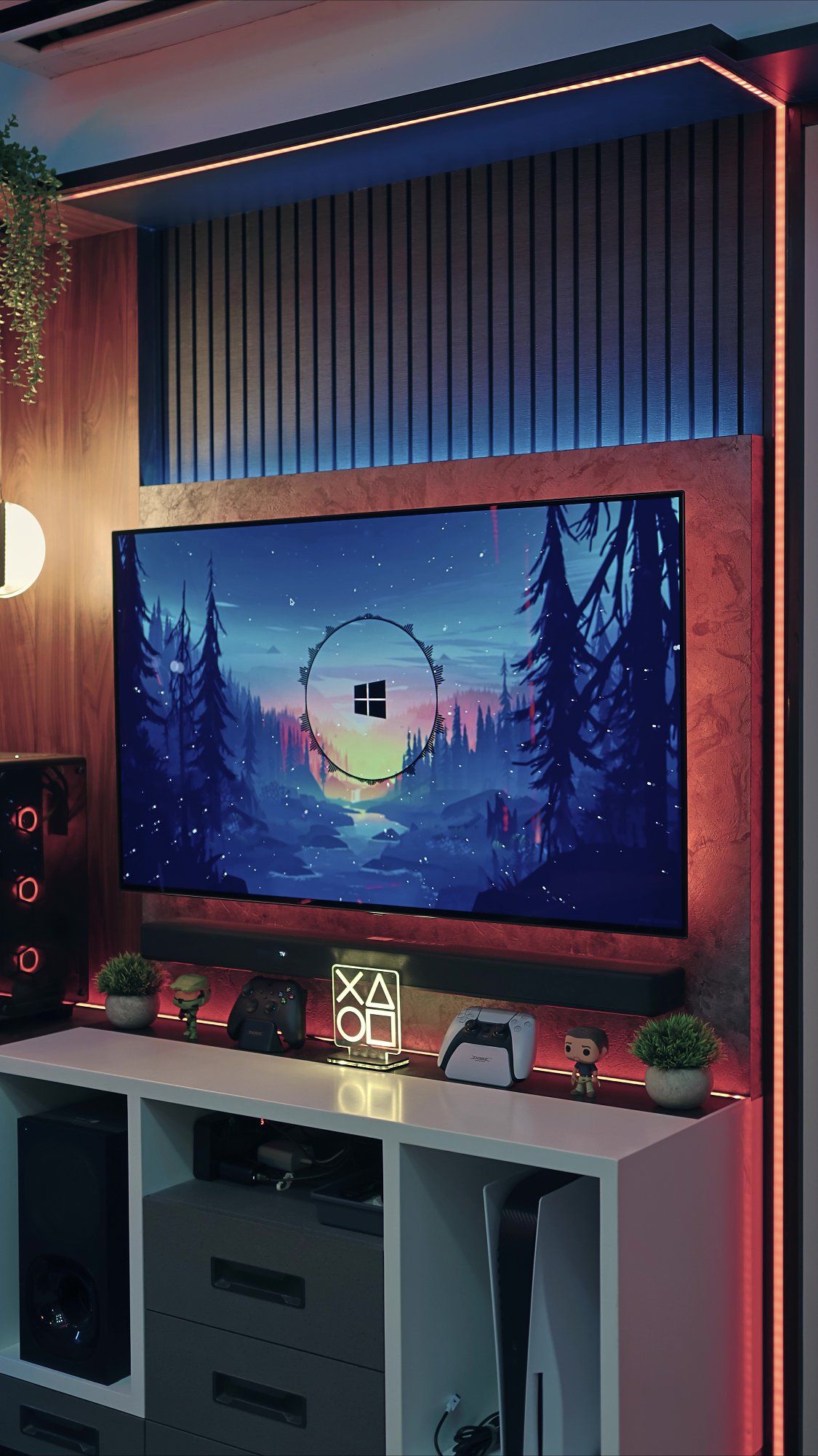 An LG OLED Smart TV and a PlayStation icons light
