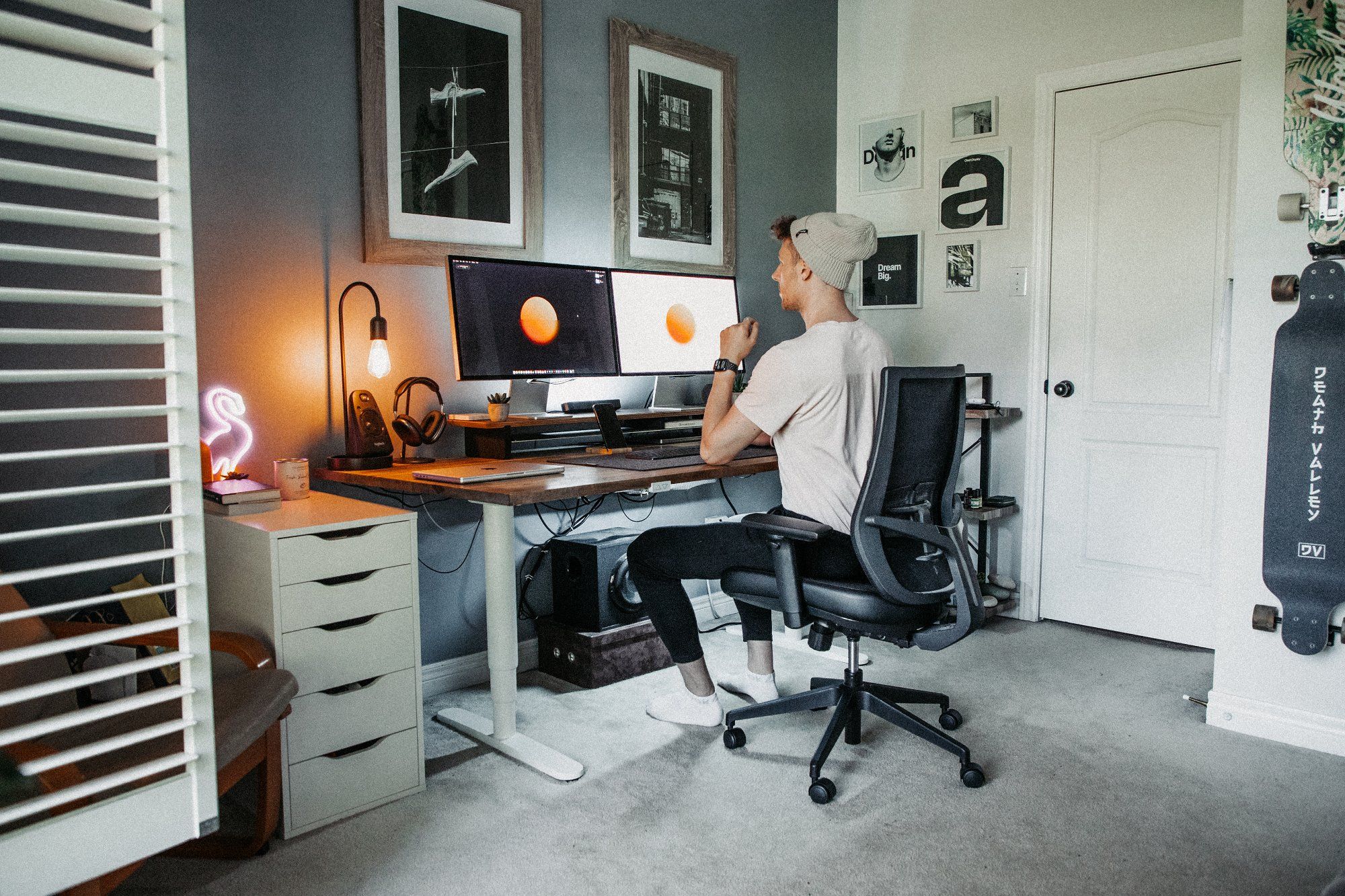 A Canadian-based freelance video editor and designer Kevin Walton at their home workstation