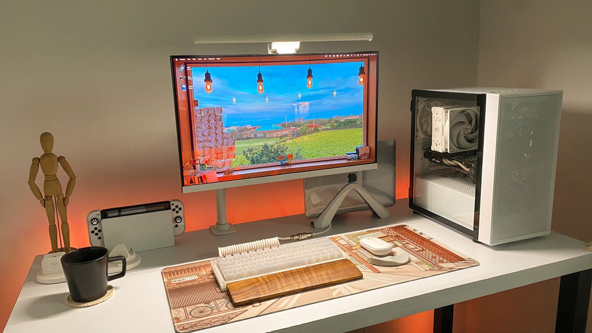 A simple and well-organised white and brown study desk setup