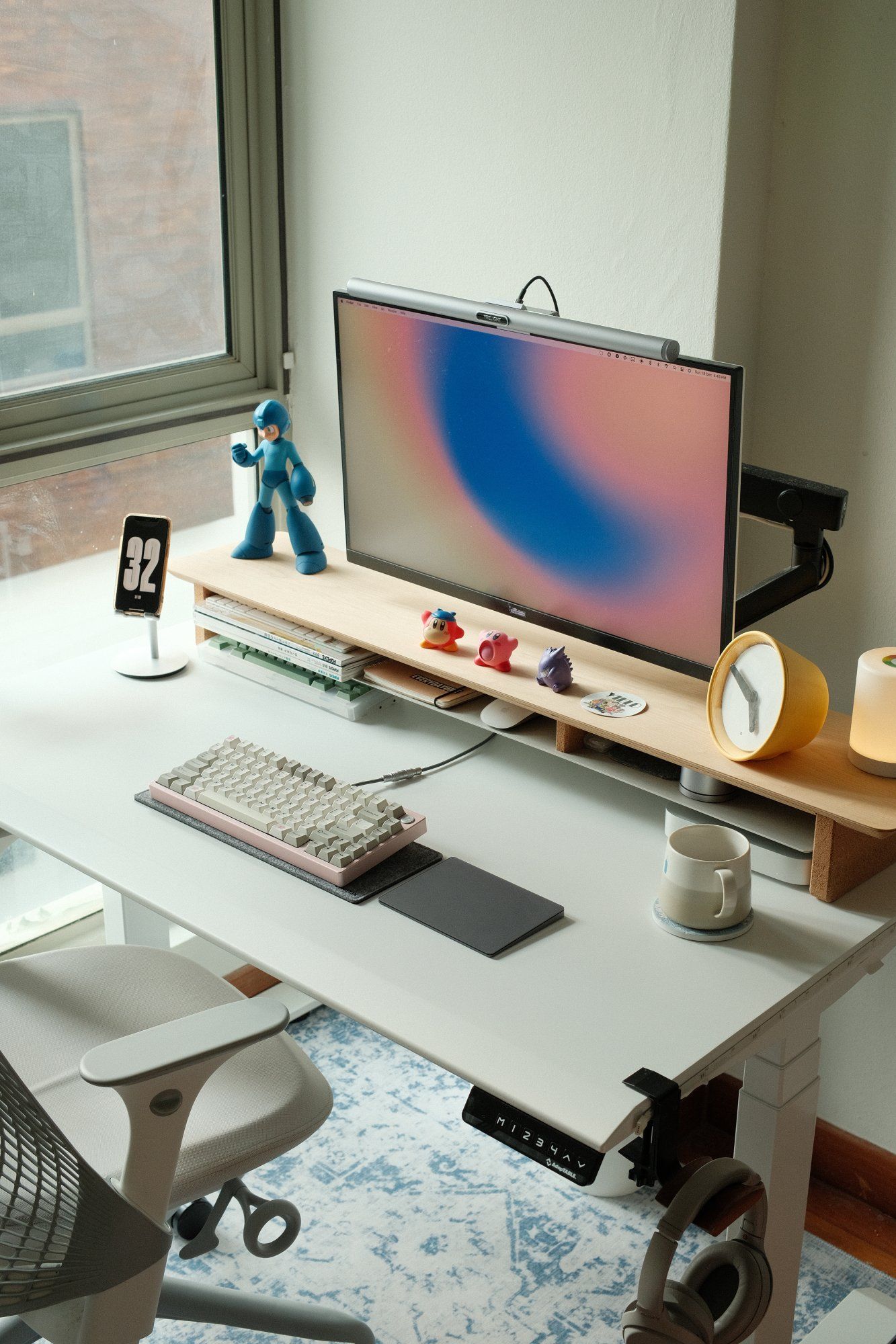 An ergonomic home workspace with an AdapTable standing desk