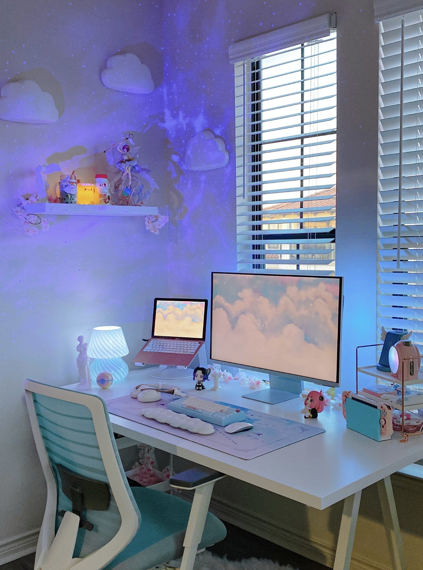 A dreamy blue IKEA desk setup with an ergonomic chair