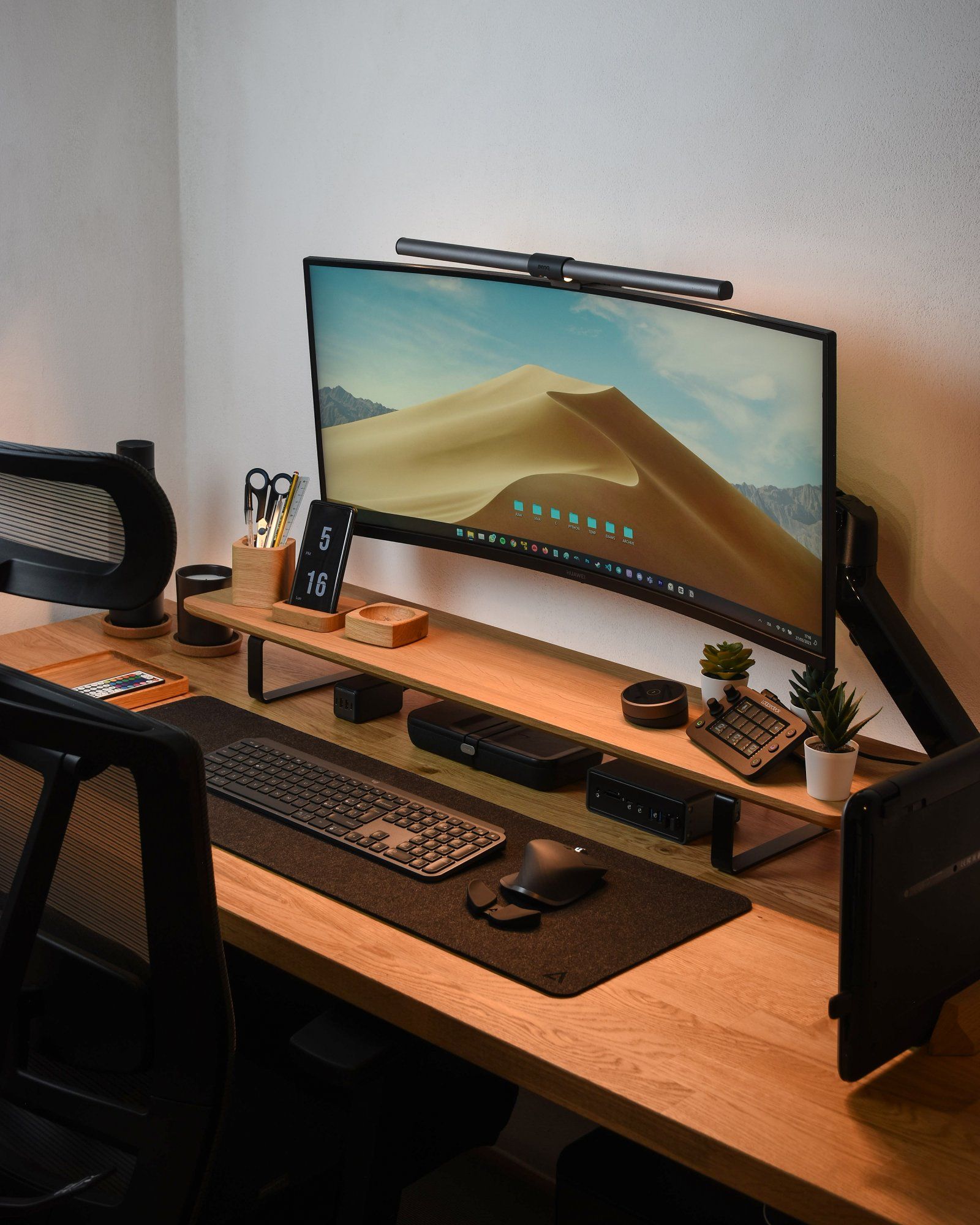 A wooden standing desk setup