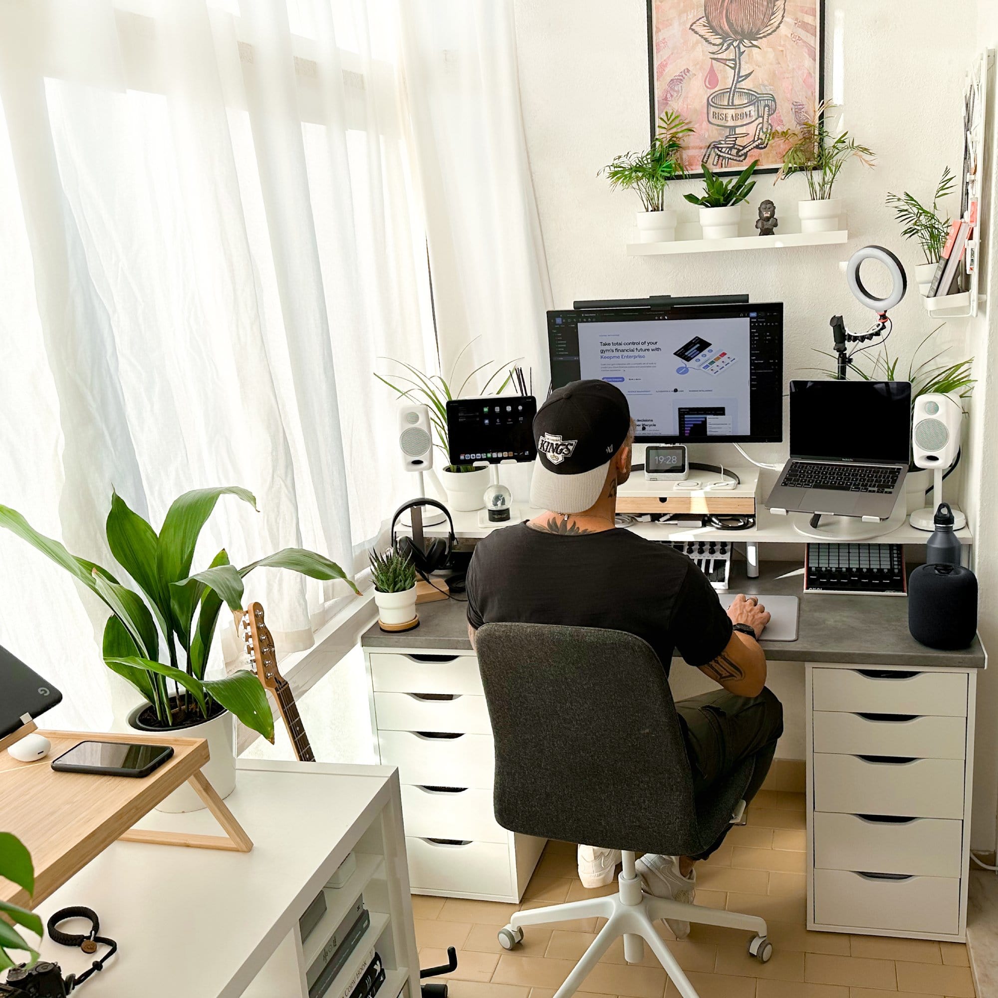 A content creator in their small IKEA home office