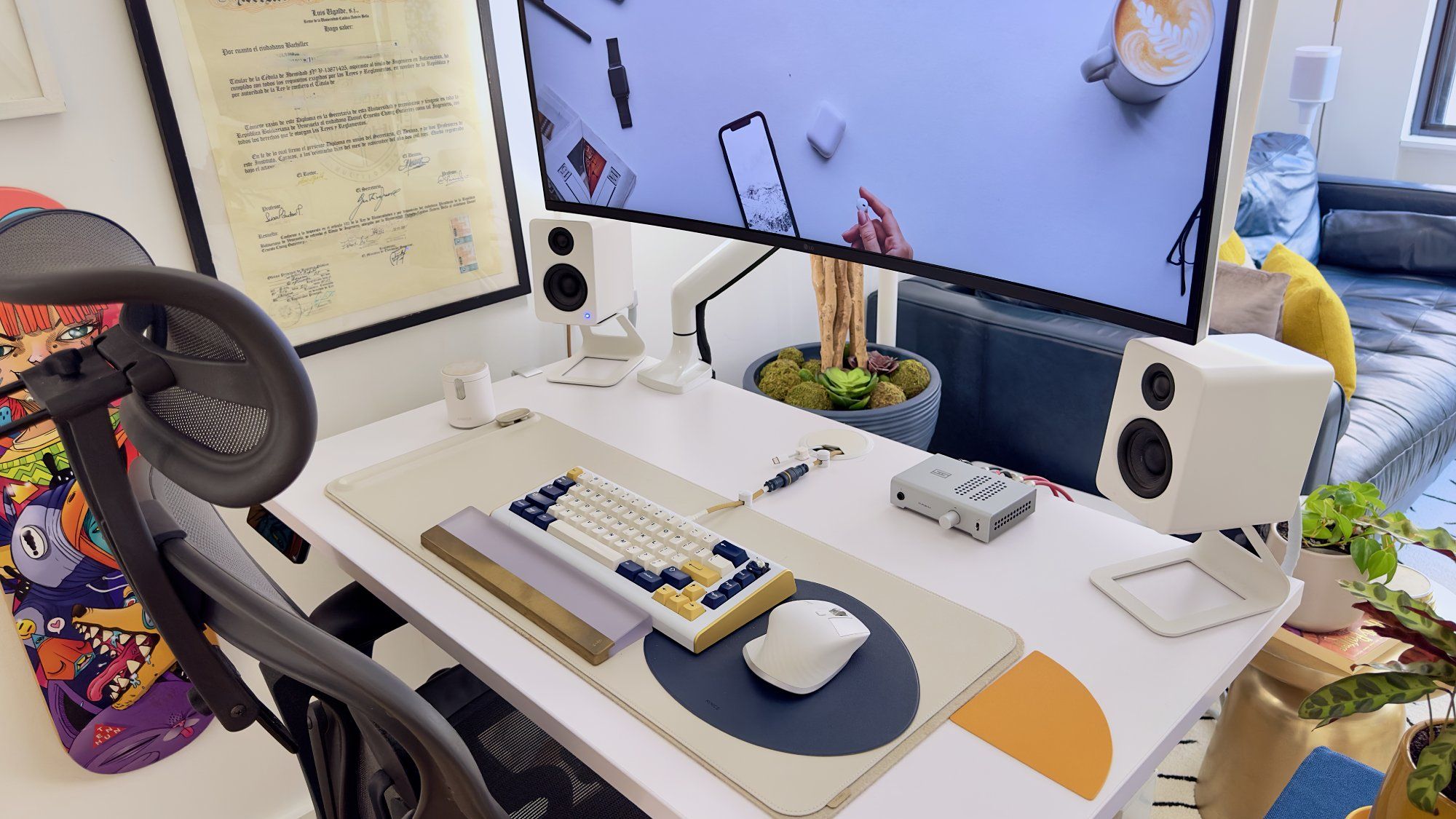 A small and productive Jarvis standing desk setup with a mechanical keyboard