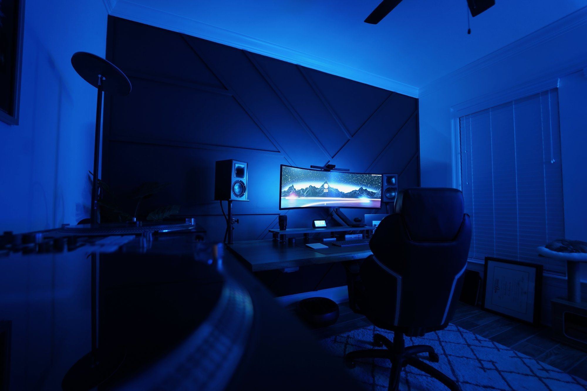 A home office in evening-blue lighting
