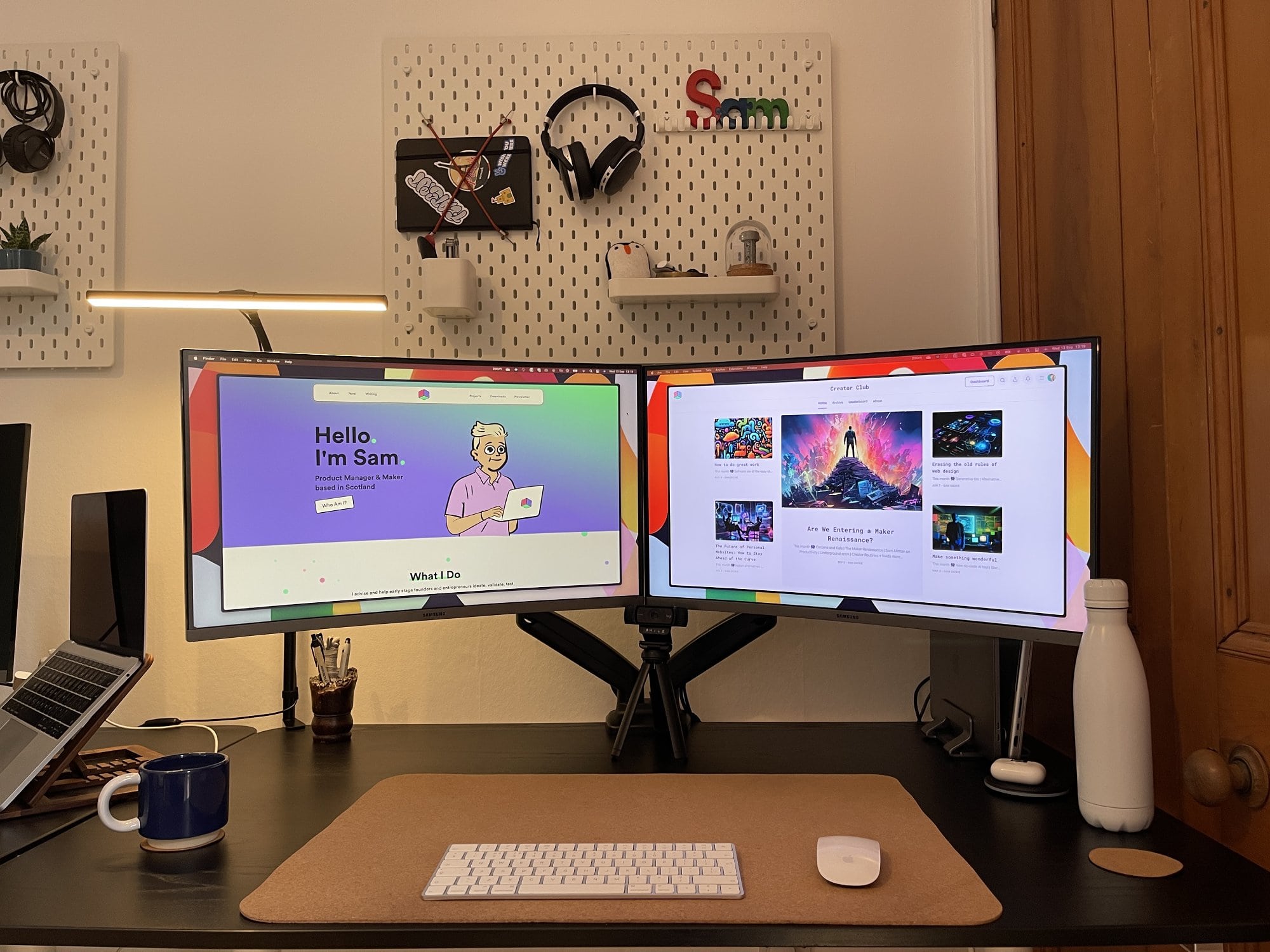 A desk setup with two curved monitors