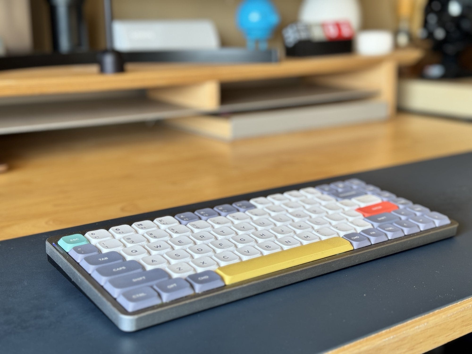 A NuPhy Air75 mechanical keyboard on the desk