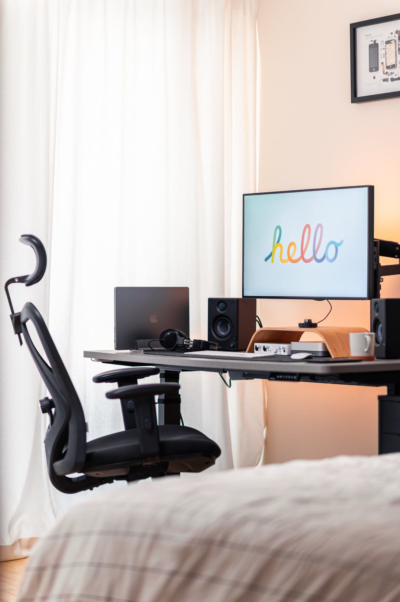 An inviting bedroom home office setup with a desk chair turned towards a desk