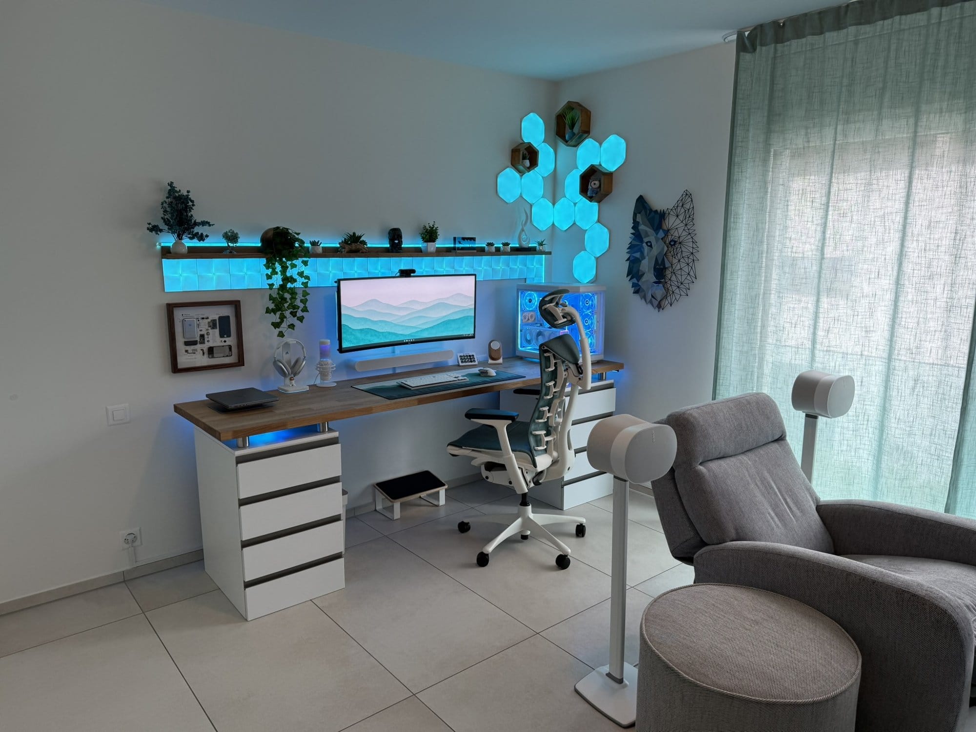 A gaming setup with an LG 38GN950 monitor, Herman Miller Embody chair, and IKEA KARLBY desk