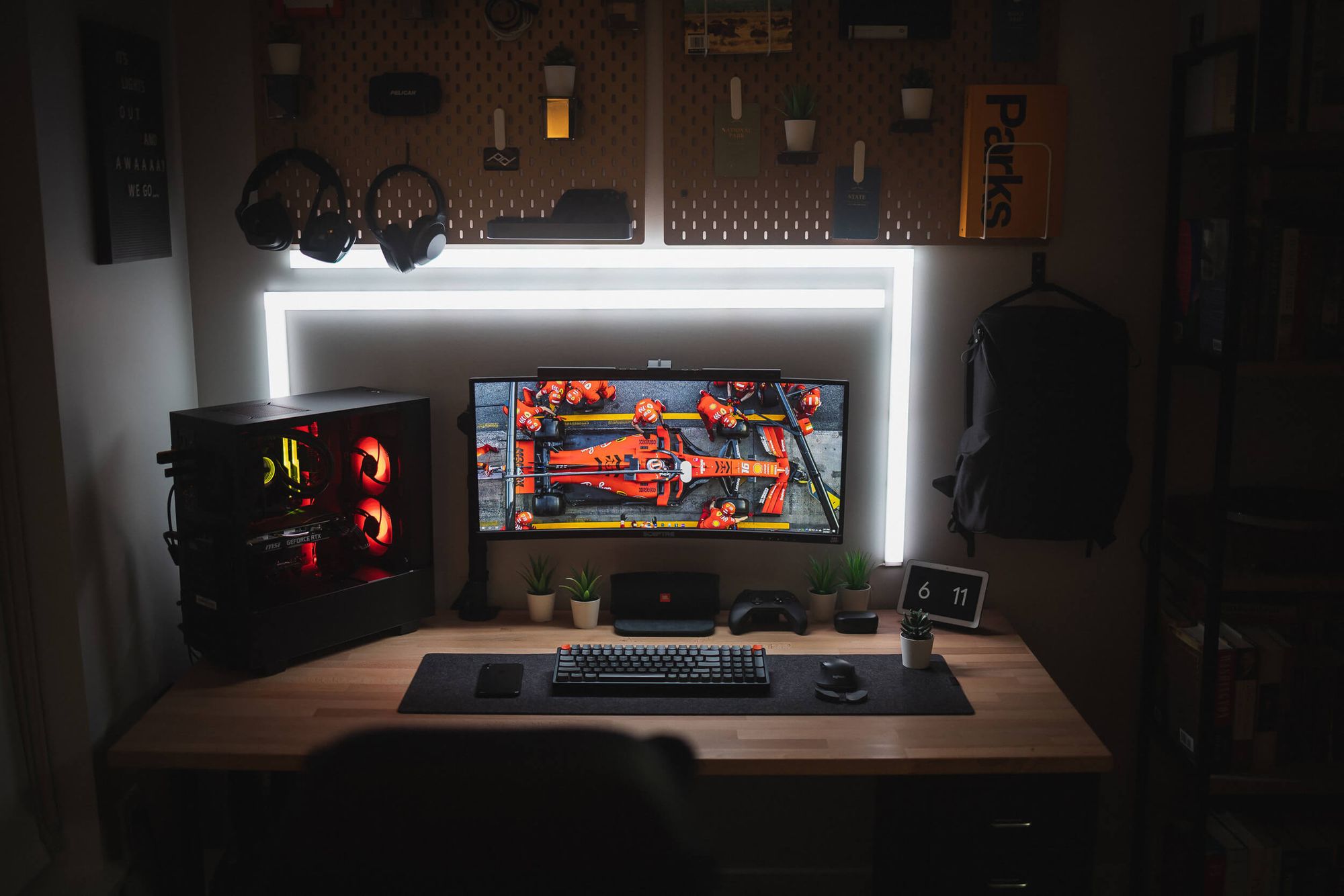 The yellow Parks book featured on Cam's pegboard showcases nearly a century of art, cartography, and prints in a captivating visual history of America’s national parks