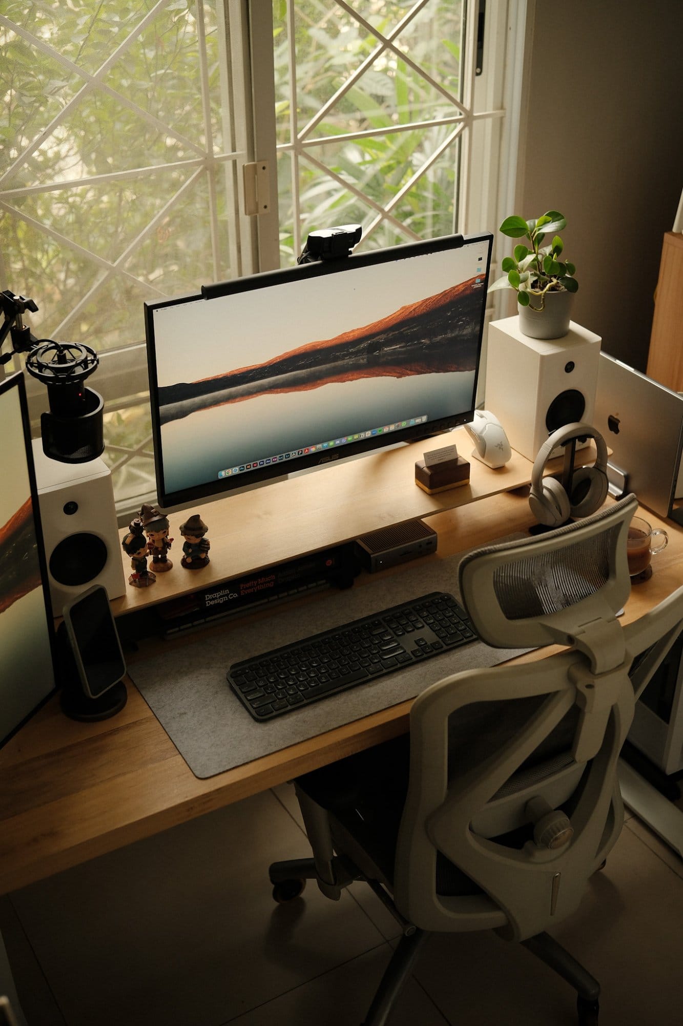 A desk setup with an ASUS ProArt PA278QV monitor, Edifier MR4 speakers, a Logitech MX Keys keyboard, a Logitech MX Master 3S mouse, and Sony XM4 headphones on a Sihoo M57 chair