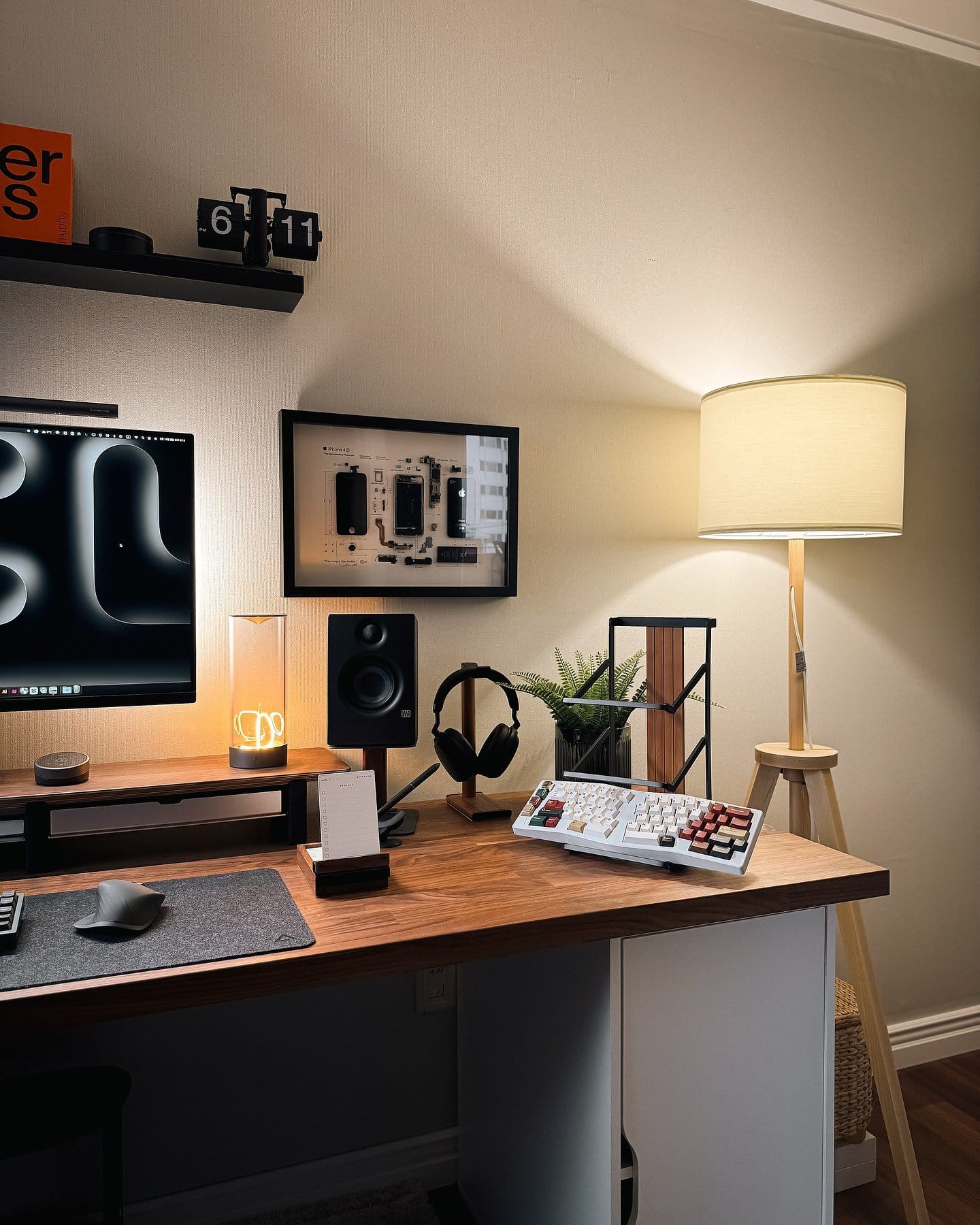 A home workspace with a PreSonus Eris 3.5 speaker, Logitech MX Master 3S mouse, and custom keyboard