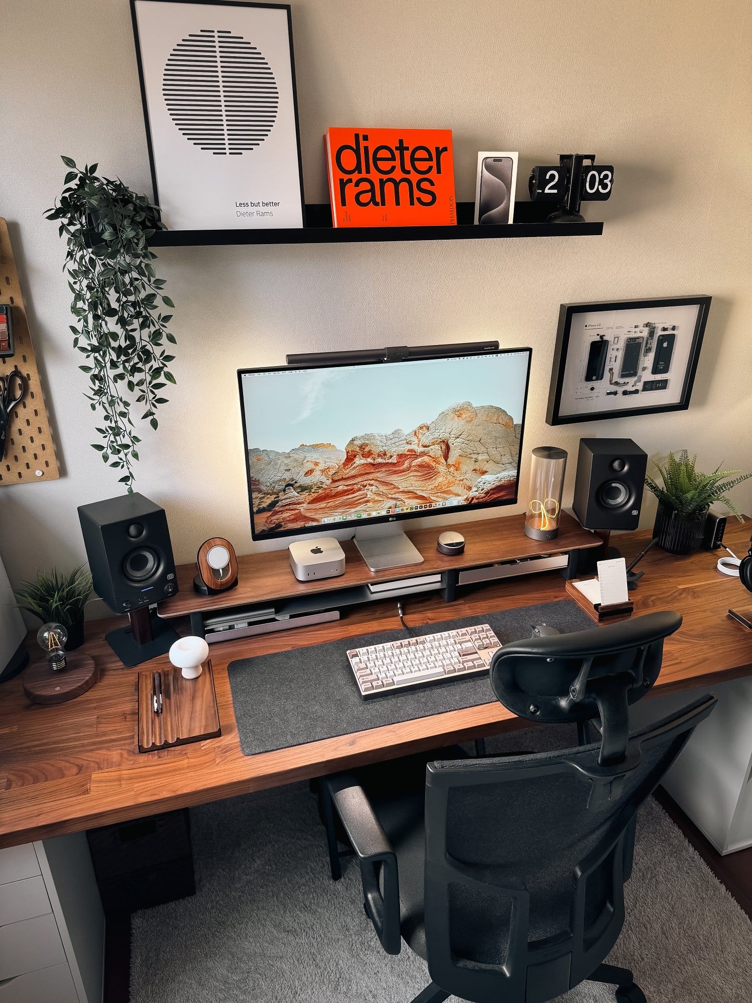 A home office setup with an LG 32UN880, Mac Mini M4, and Sidiz chair