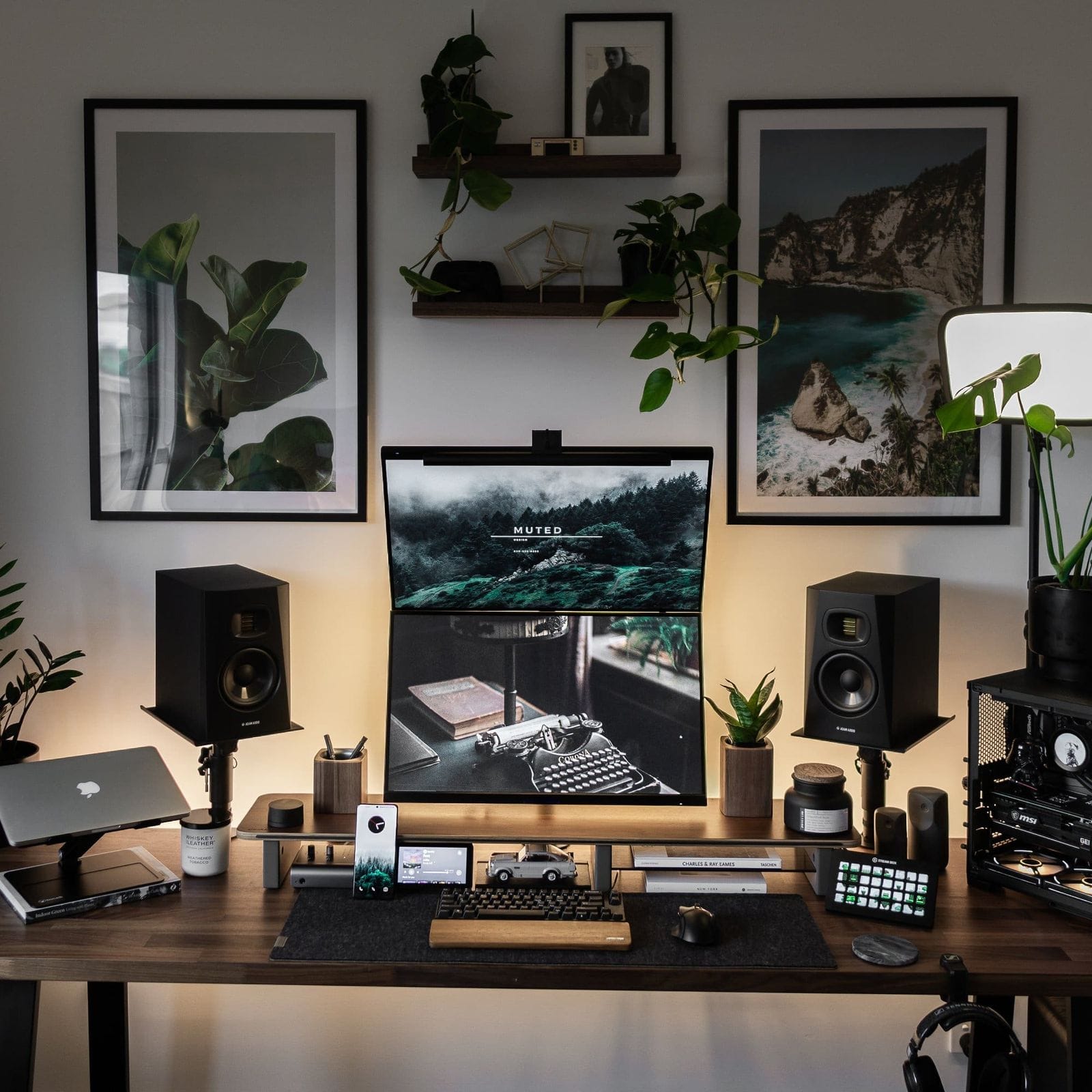 A home office with vertically stacked monitors and IKEA MOSSLANDA picture ledges