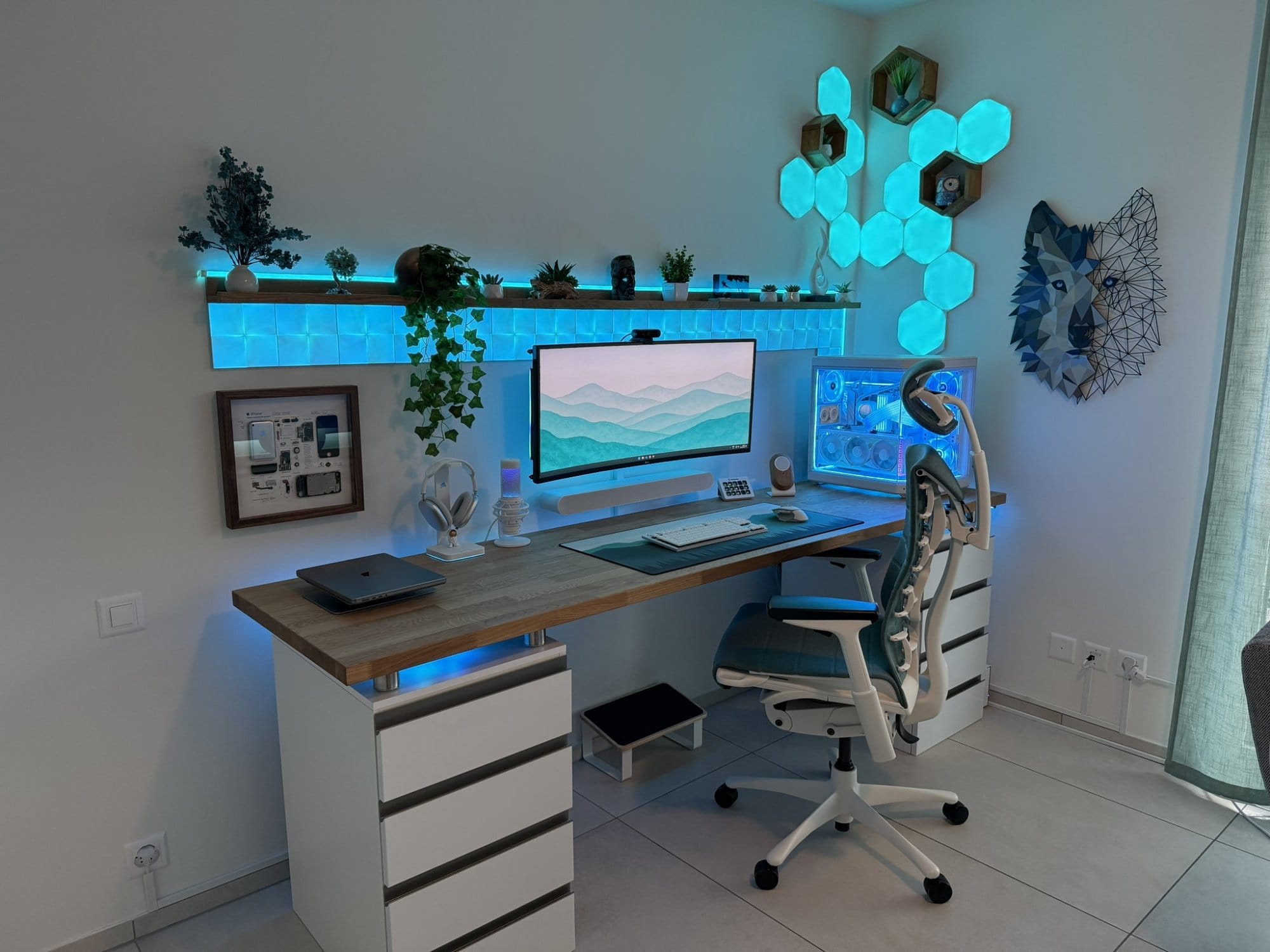A workspace setup with Nanoleaf LED wall panels