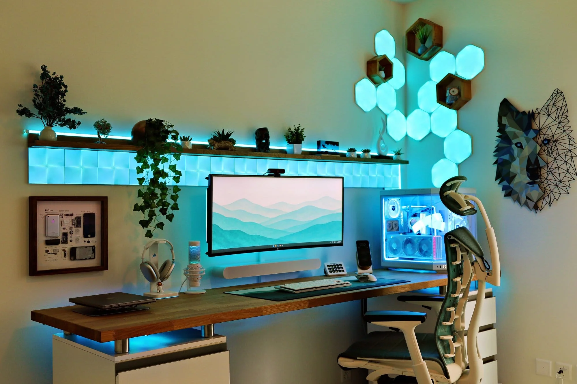 A desk setup with an LG 38GN950 monitor, Herman Miller Embody Gaming chair, and a Hyte Y70 PC case