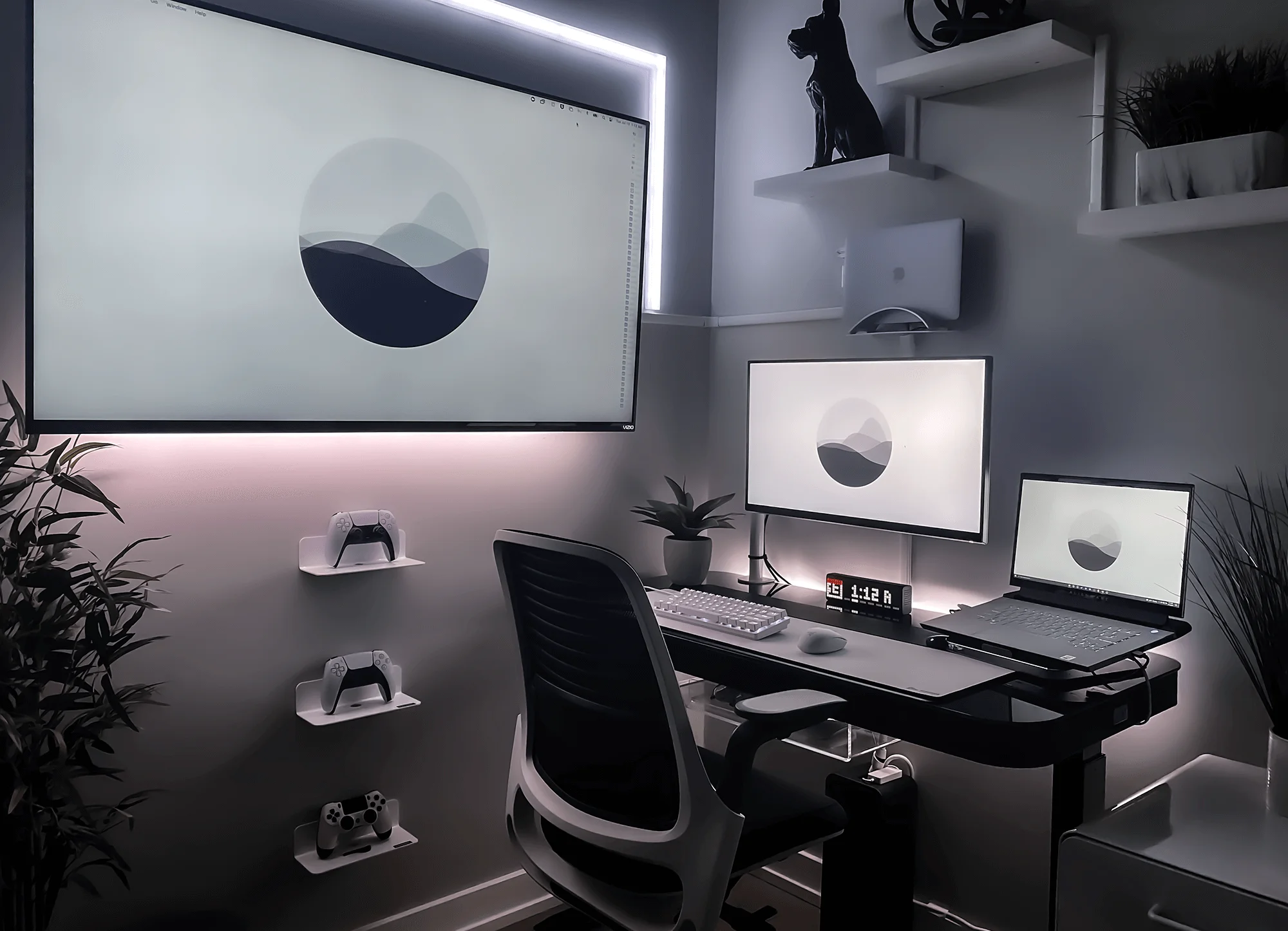A minimalist Alienware battlestation with a Steelcase Series 1 office chair